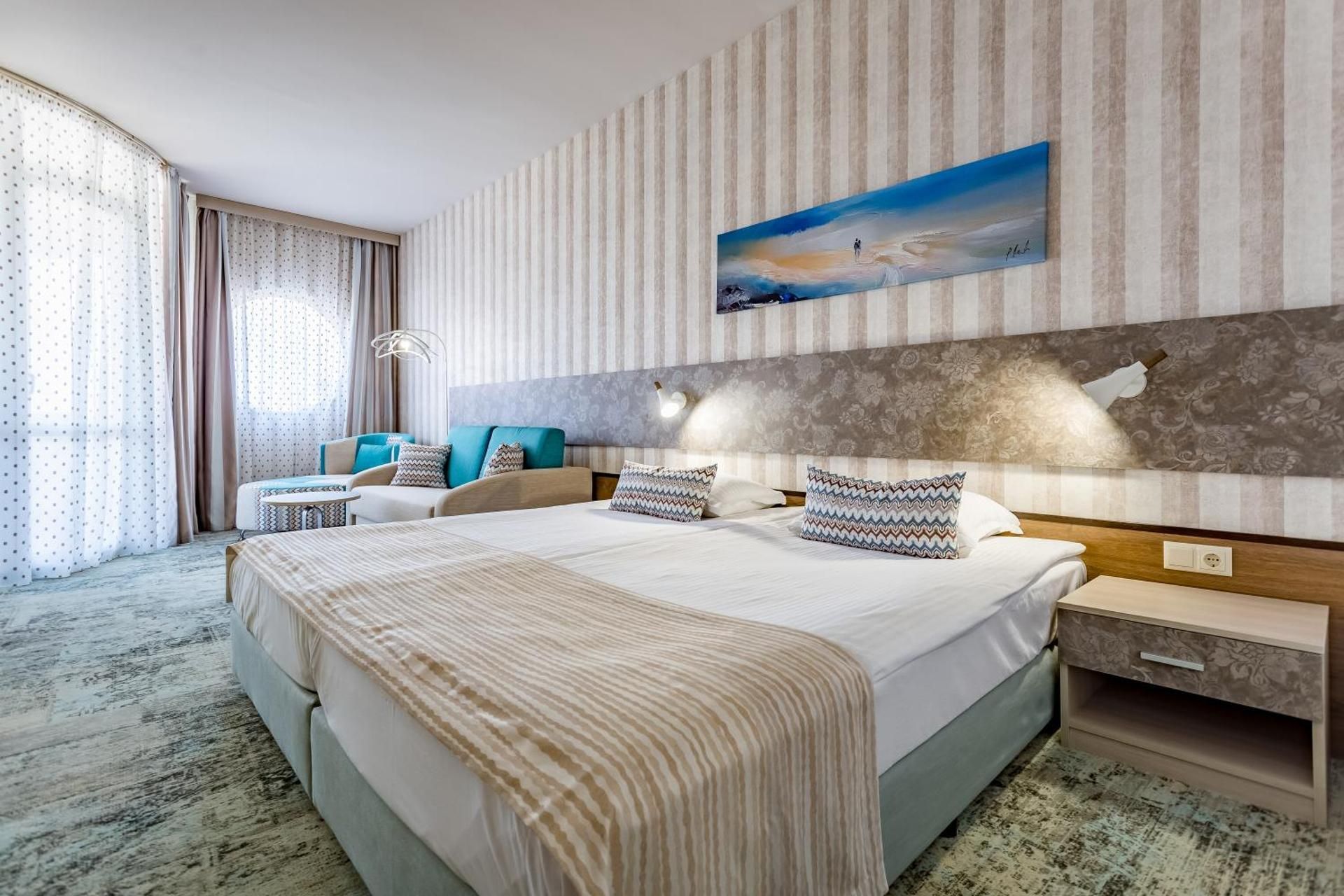 Junior Suite with Side Sea View (3 Adults + 1 Child)