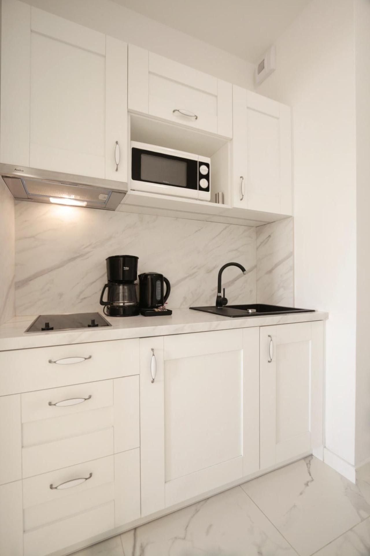 Studio Apartment with Balcony and Garage Space