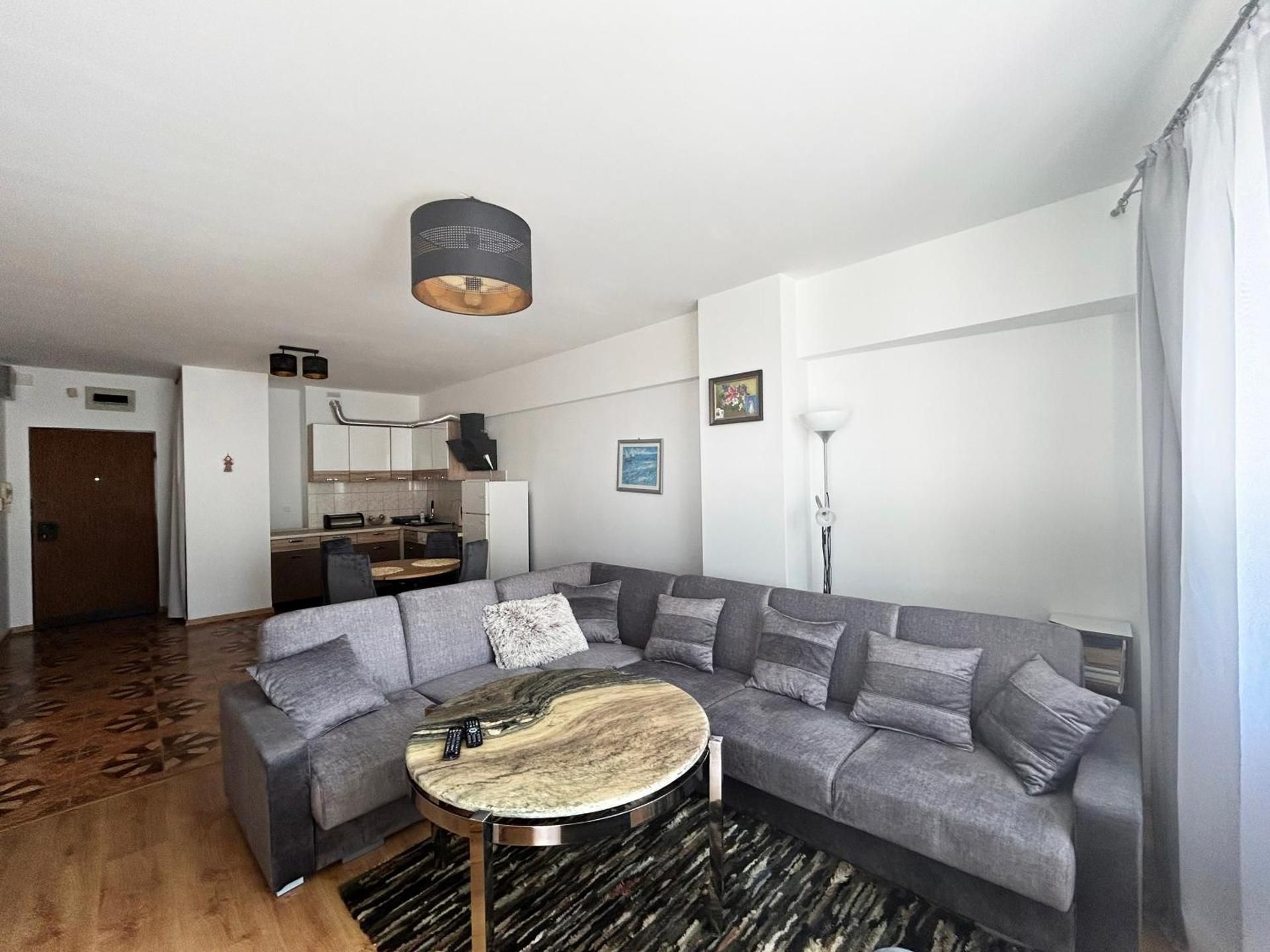 One-Bedroom Apartment with Side Sea View