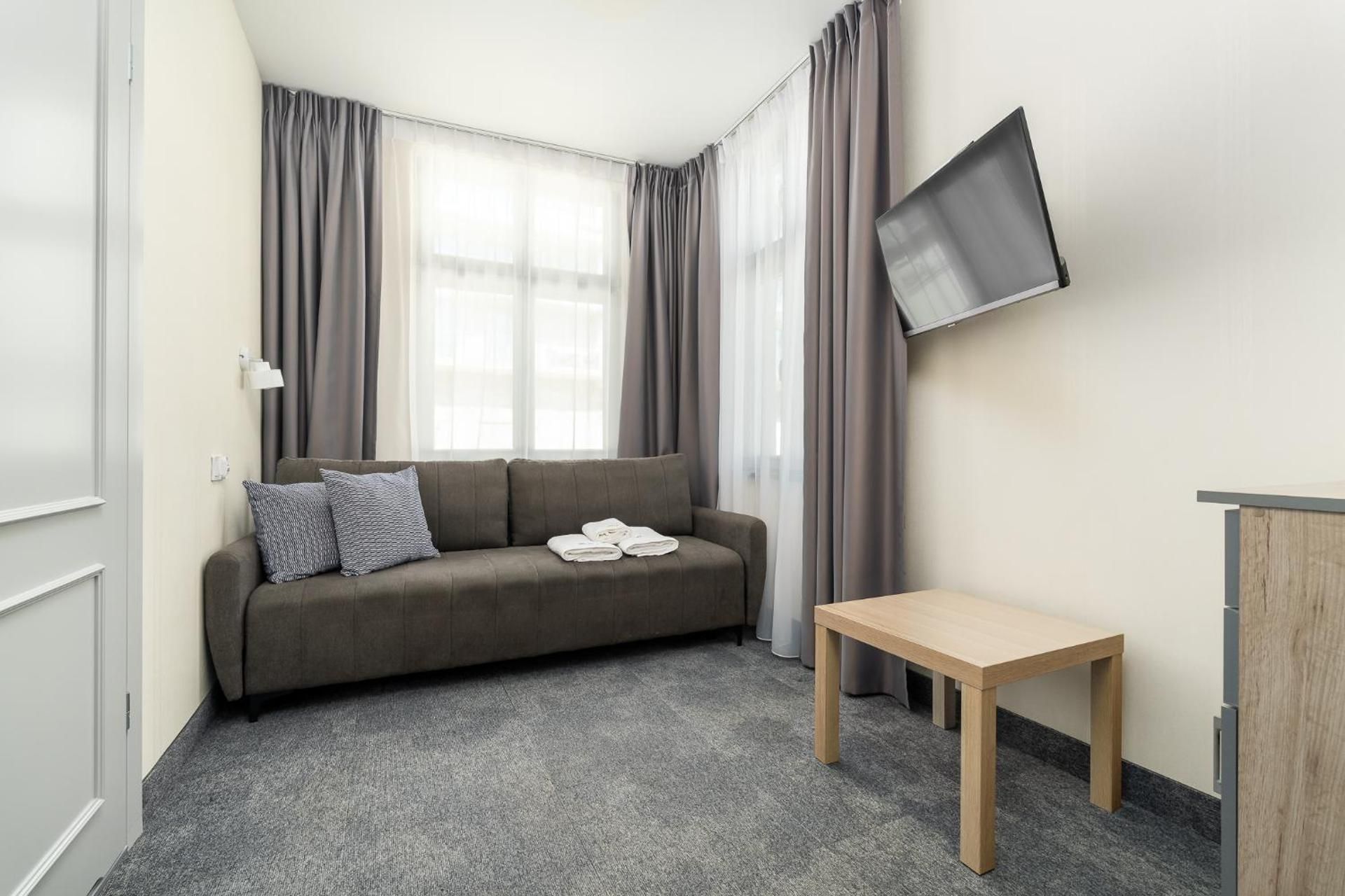 Small Economy Room with a Sofa Bed