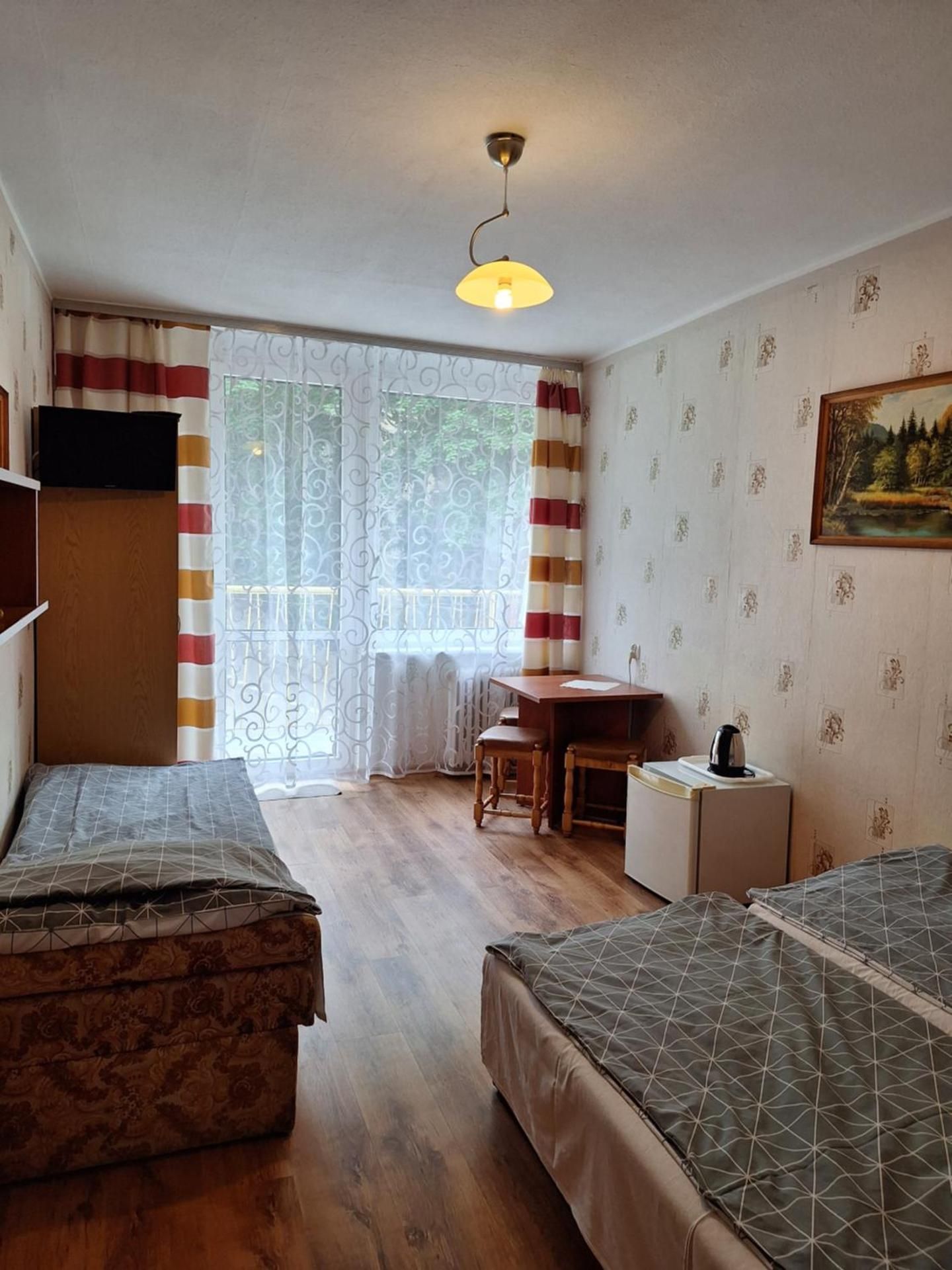 Economy Triple Room with Shared Bathroom
