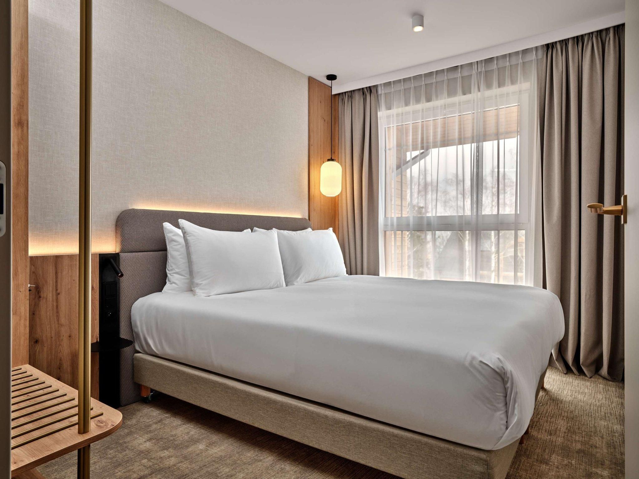 Deluxe Room with one double bed and sofa bed