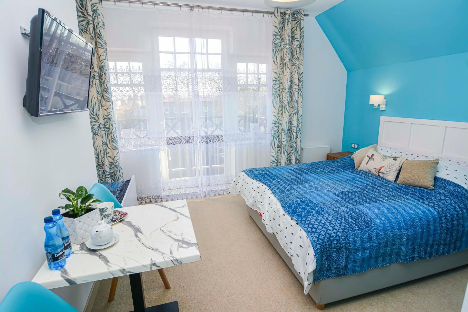 Double Room with Balcony (2 Adults + 1 Child)