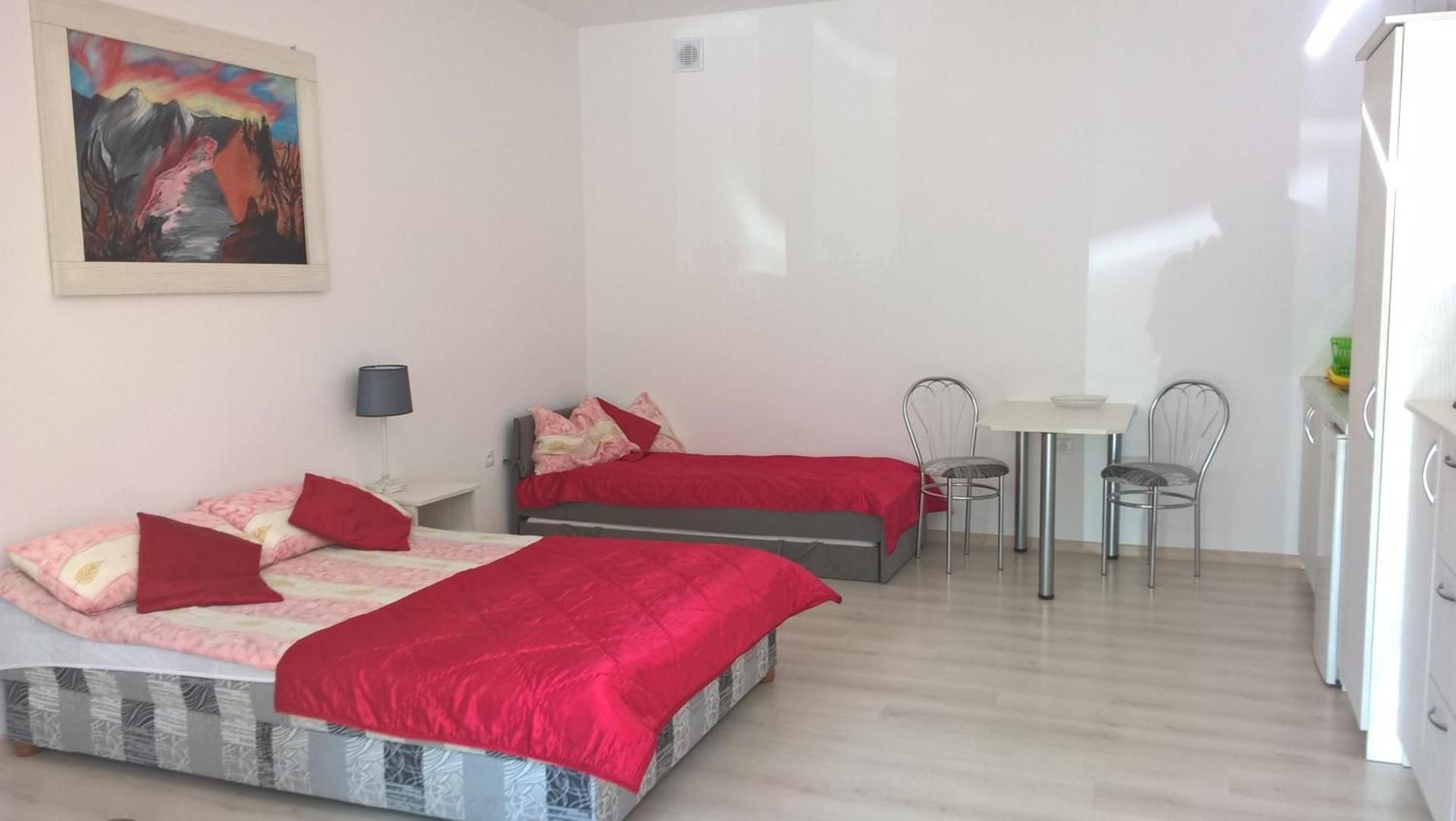 Quadruple Room with Private Bathroom