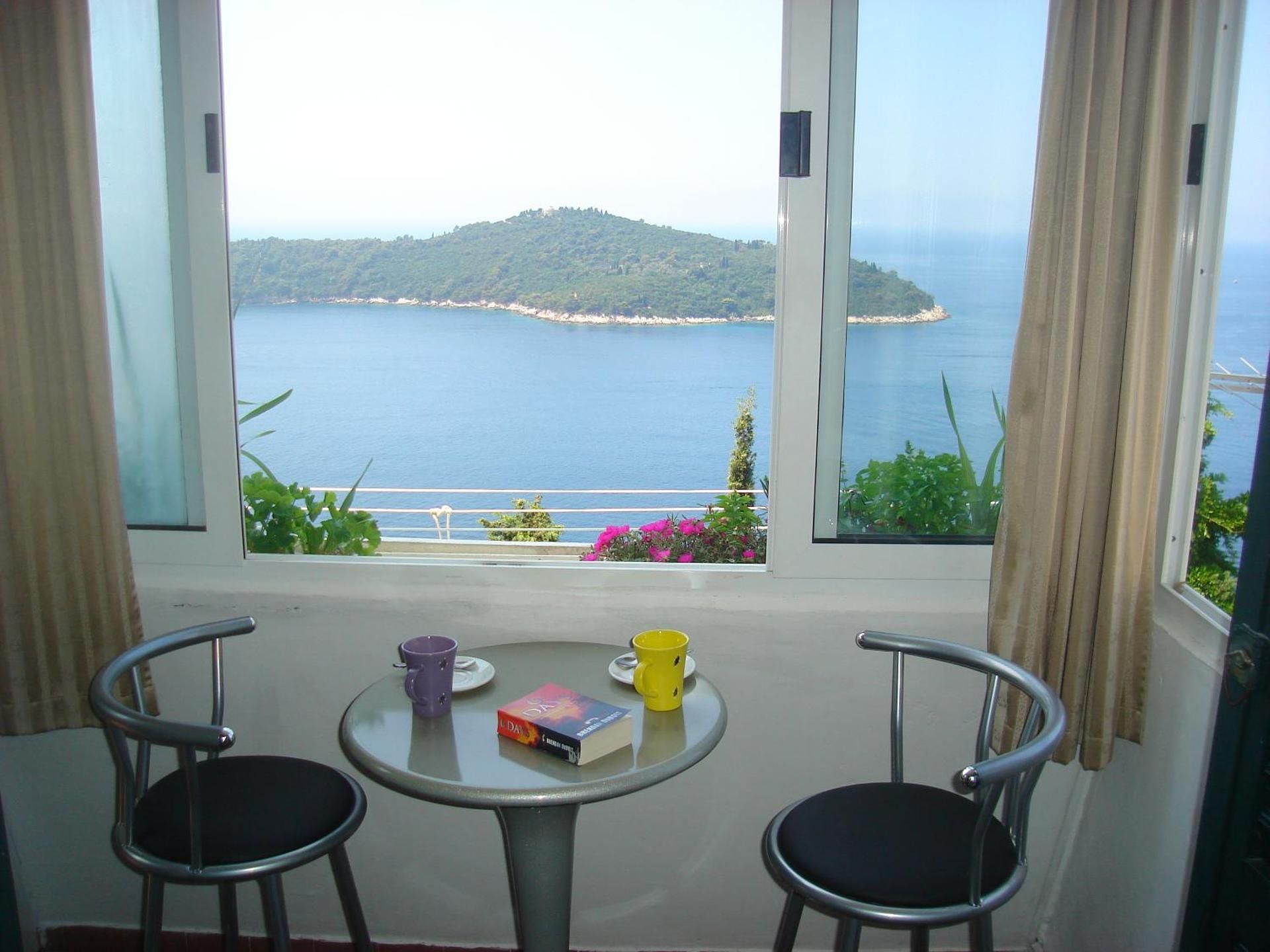 One-Bedroom Apartment with Balcony and Sea View