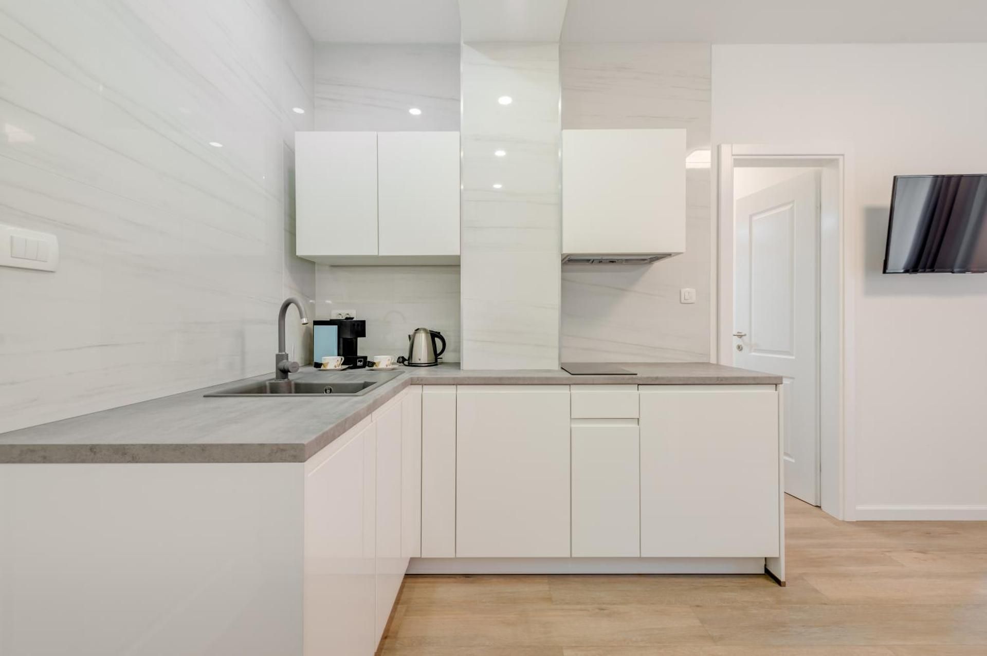 CAPITAL Apartments and Rooms