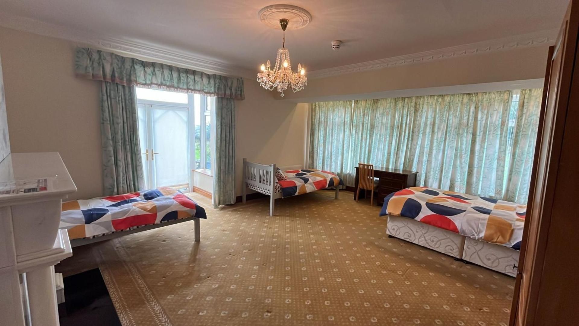 Quadruple Room with Shared Bathroom