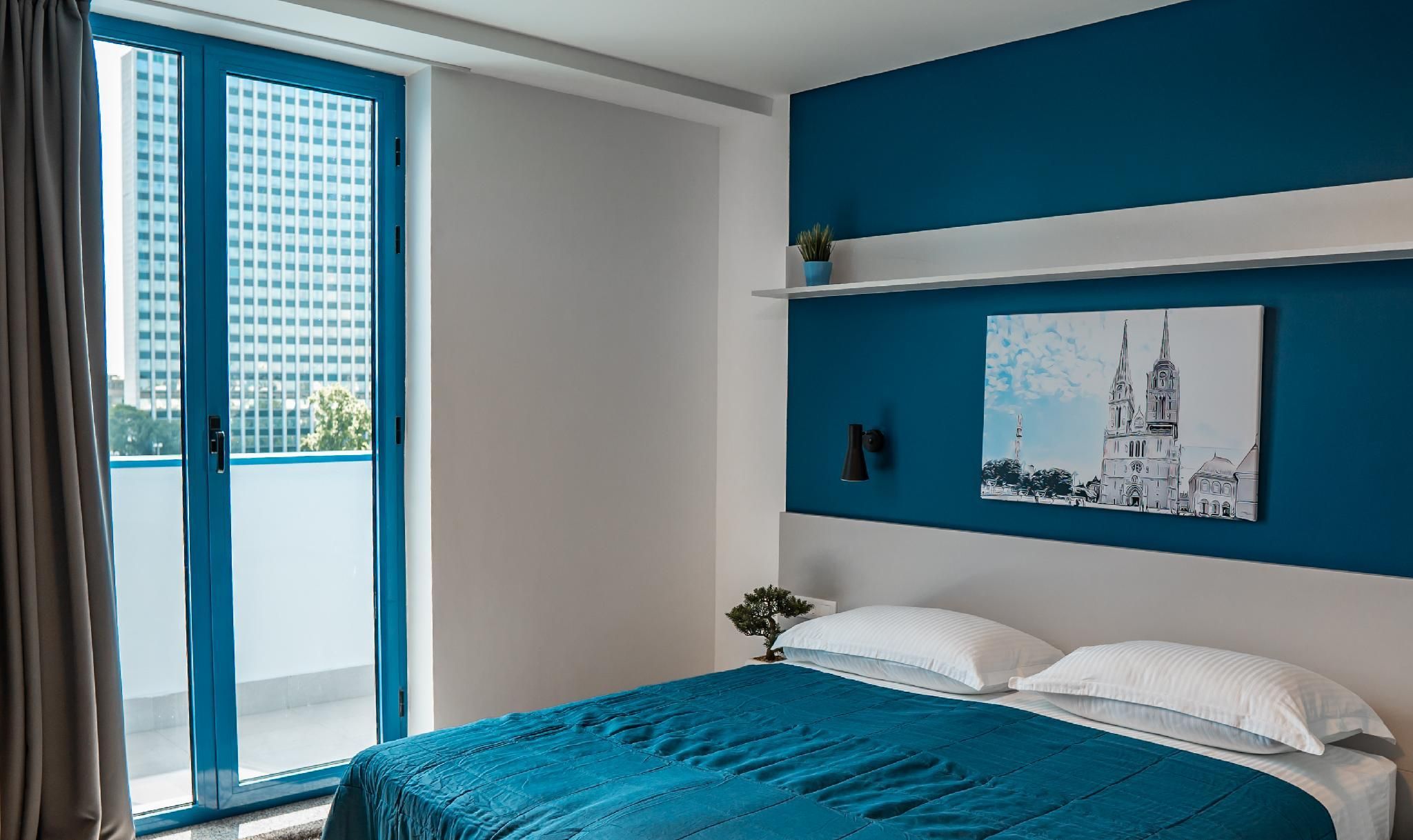 Standard Triple Room with Balcony