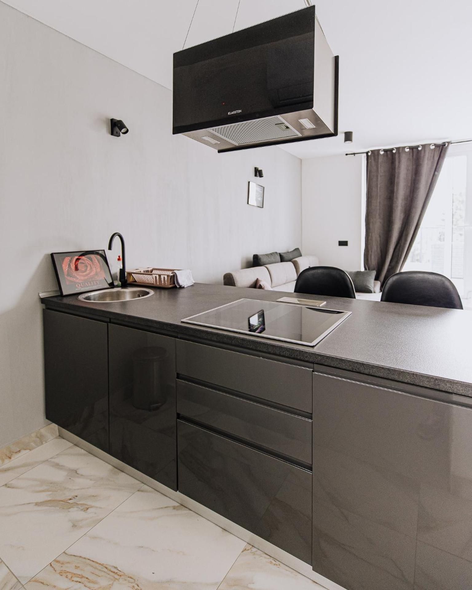 One-Bedroom Apartment with Balcony and City View