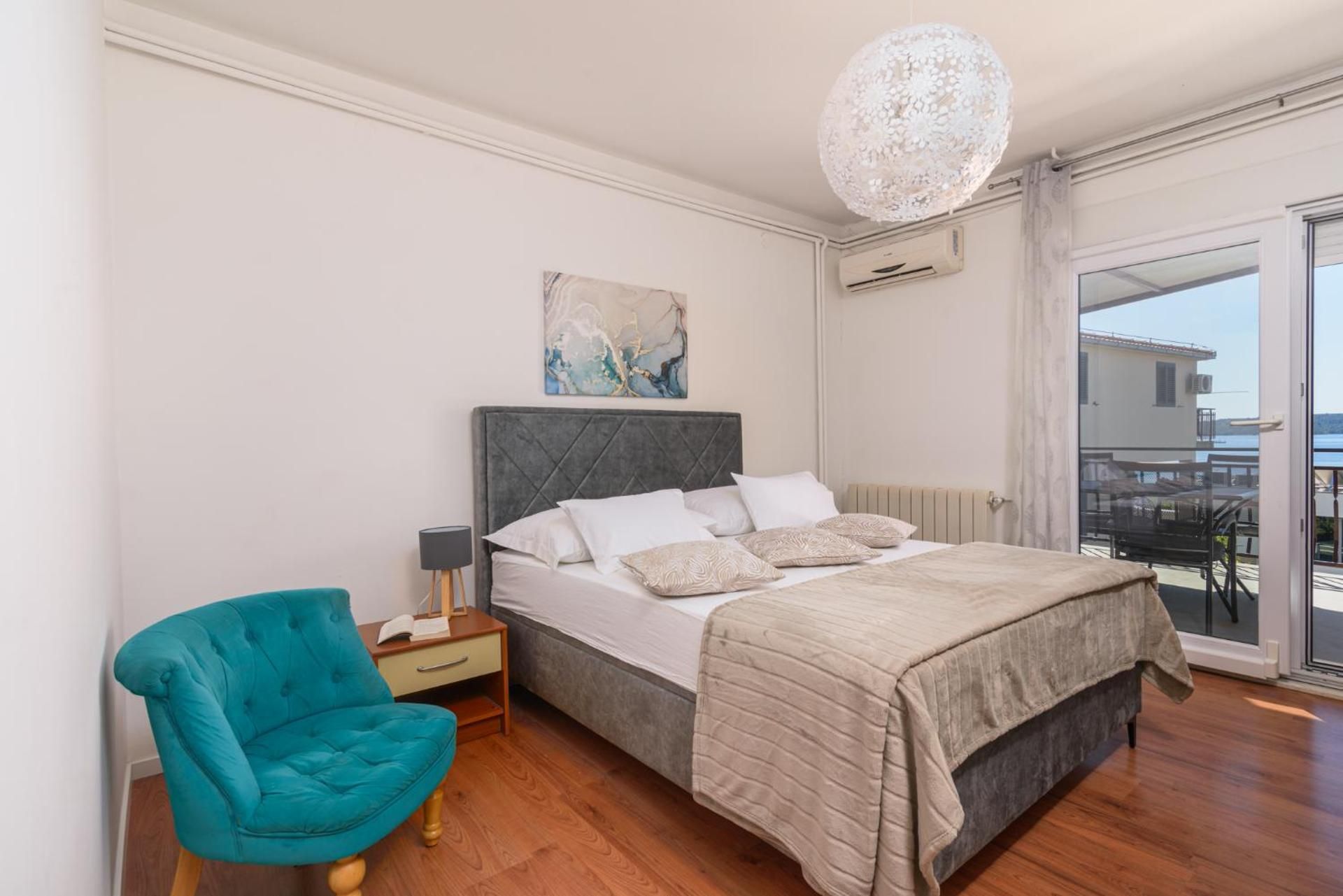 One-Bedroom Apartment with Balcony and Sea View