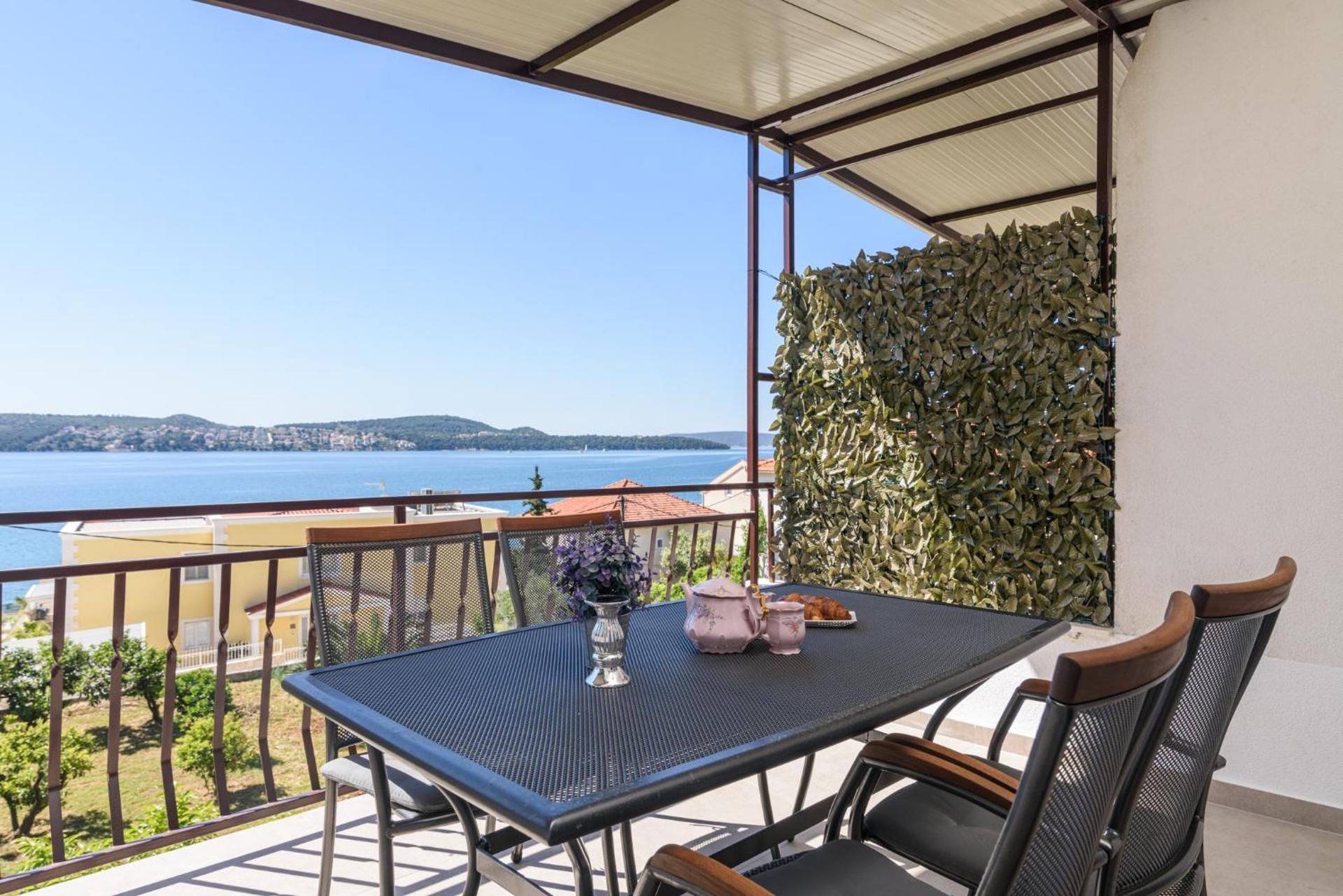 One-Bedroom Apartment with Balcony and Sea View