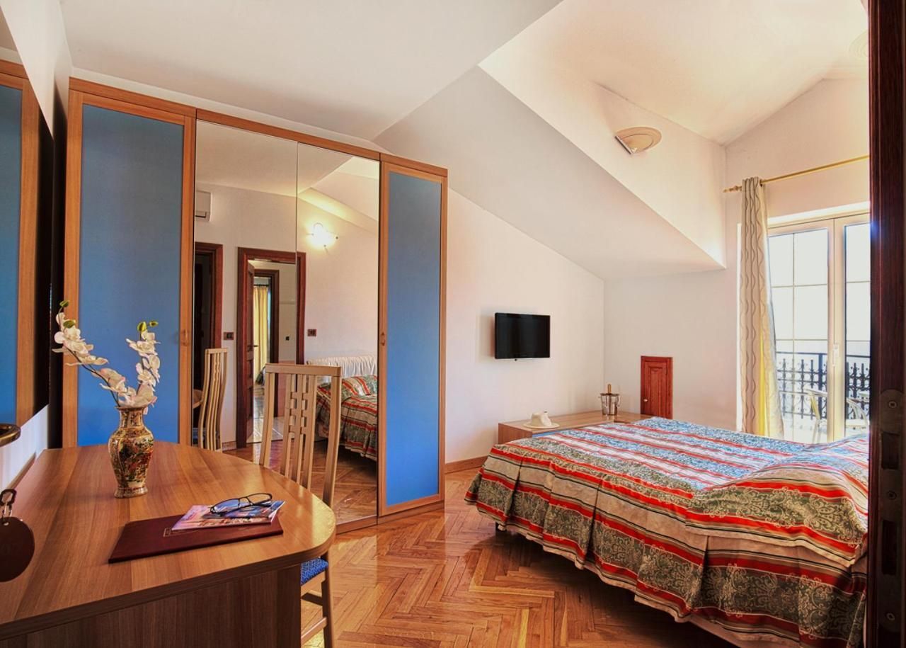 Quadruple Room with Balcony