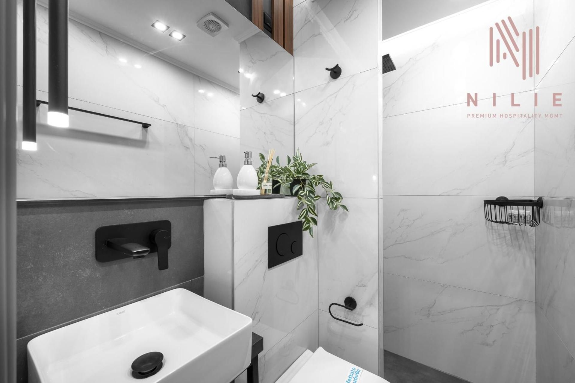 One-Bedroom Apartment with Balcony and City View