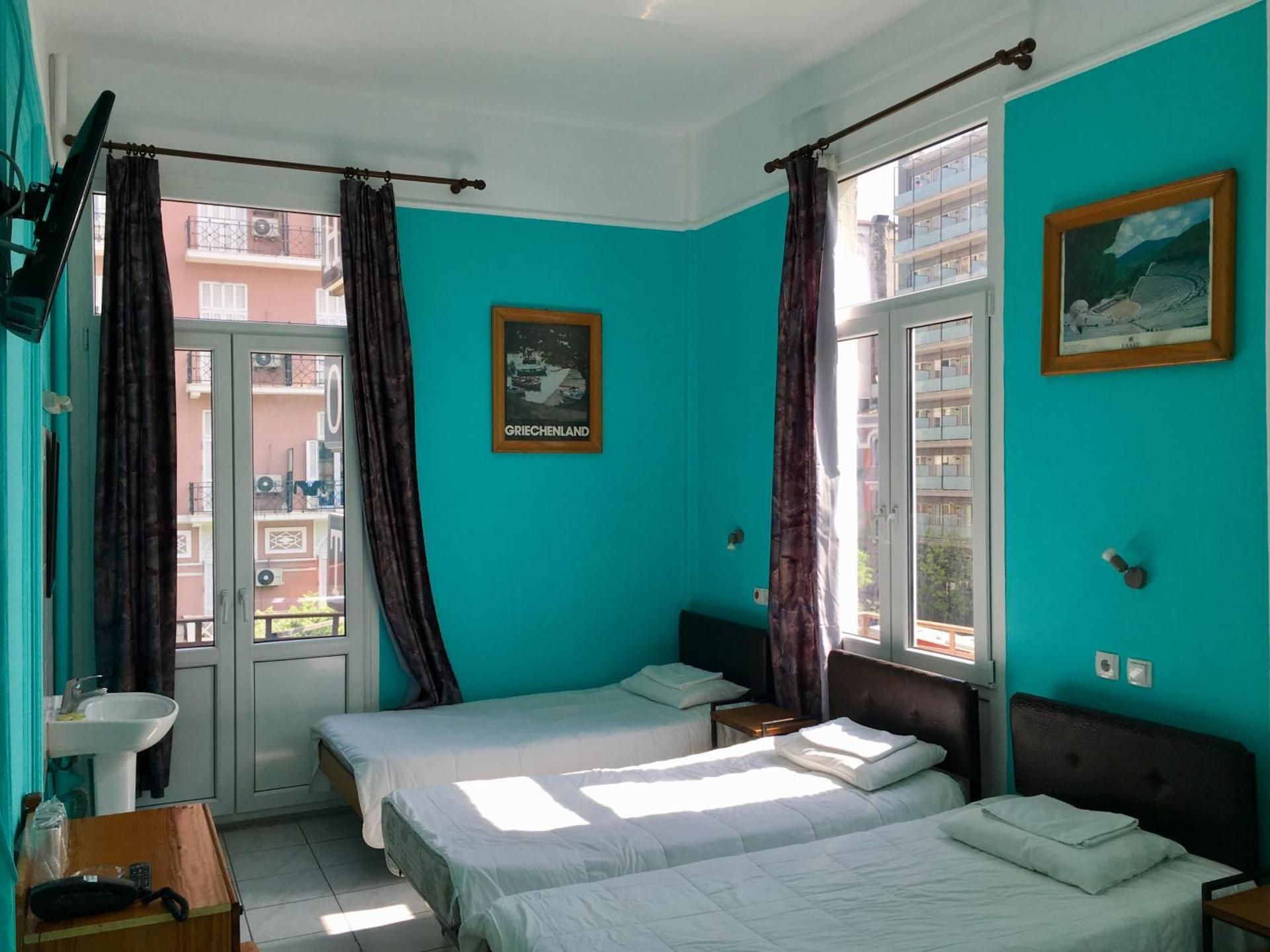 Economy Quadruple Room with Shared Bathroom