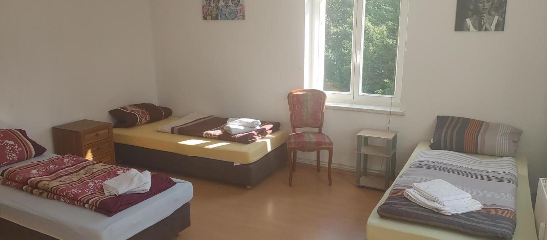 Basic Triple Room with Shared Bathroom