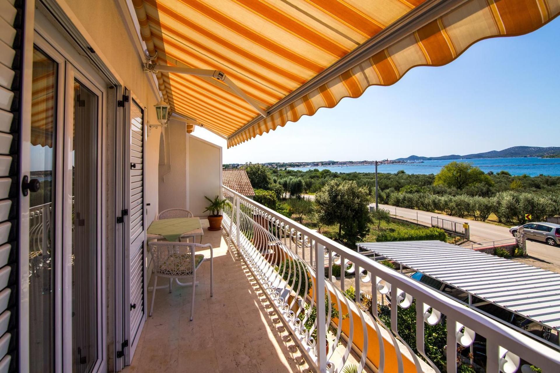 One-Bedroom Apartment with Balcony and Sea View