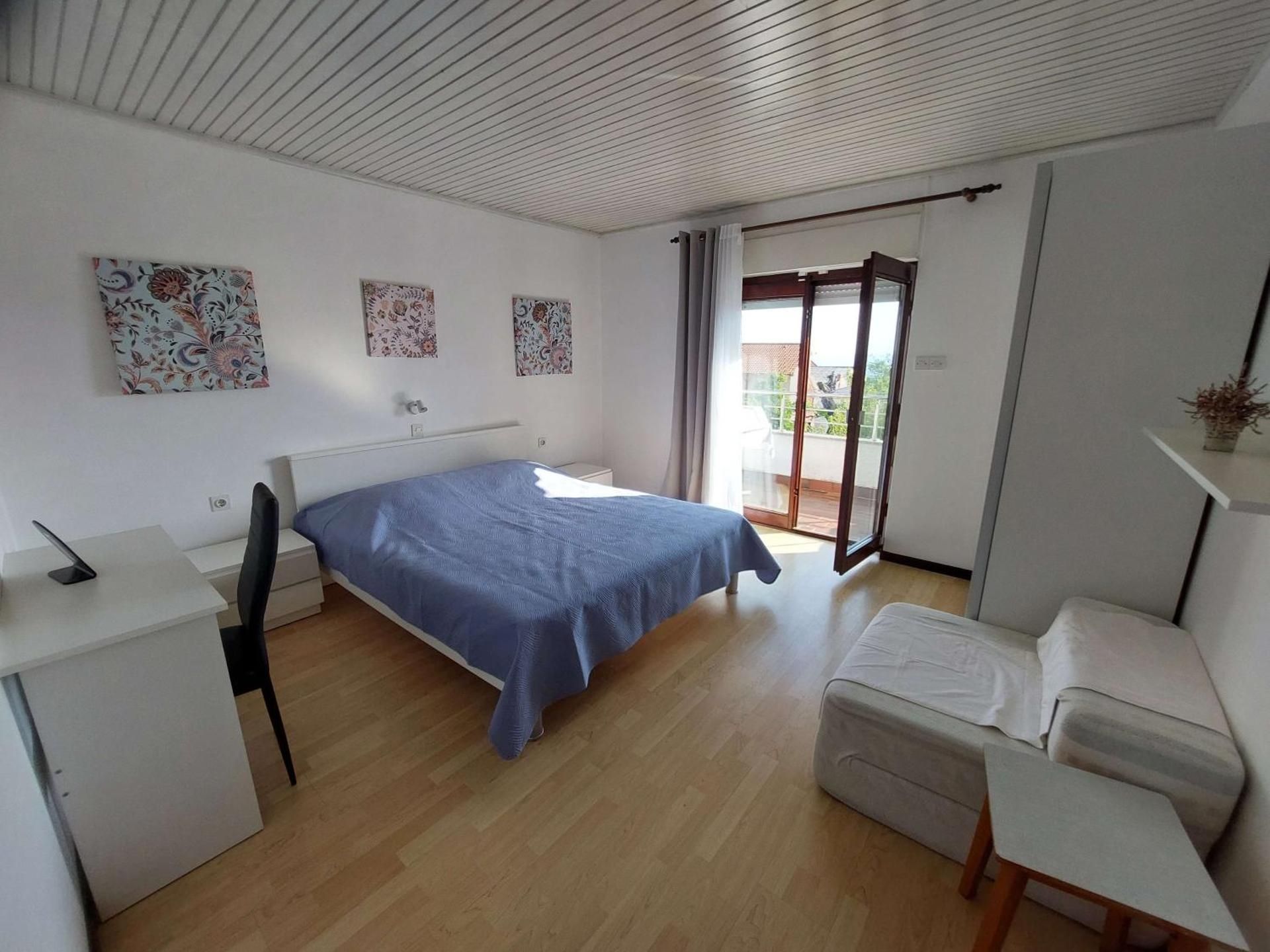 Two-Bedroom Apartment with Balcony and Sea View