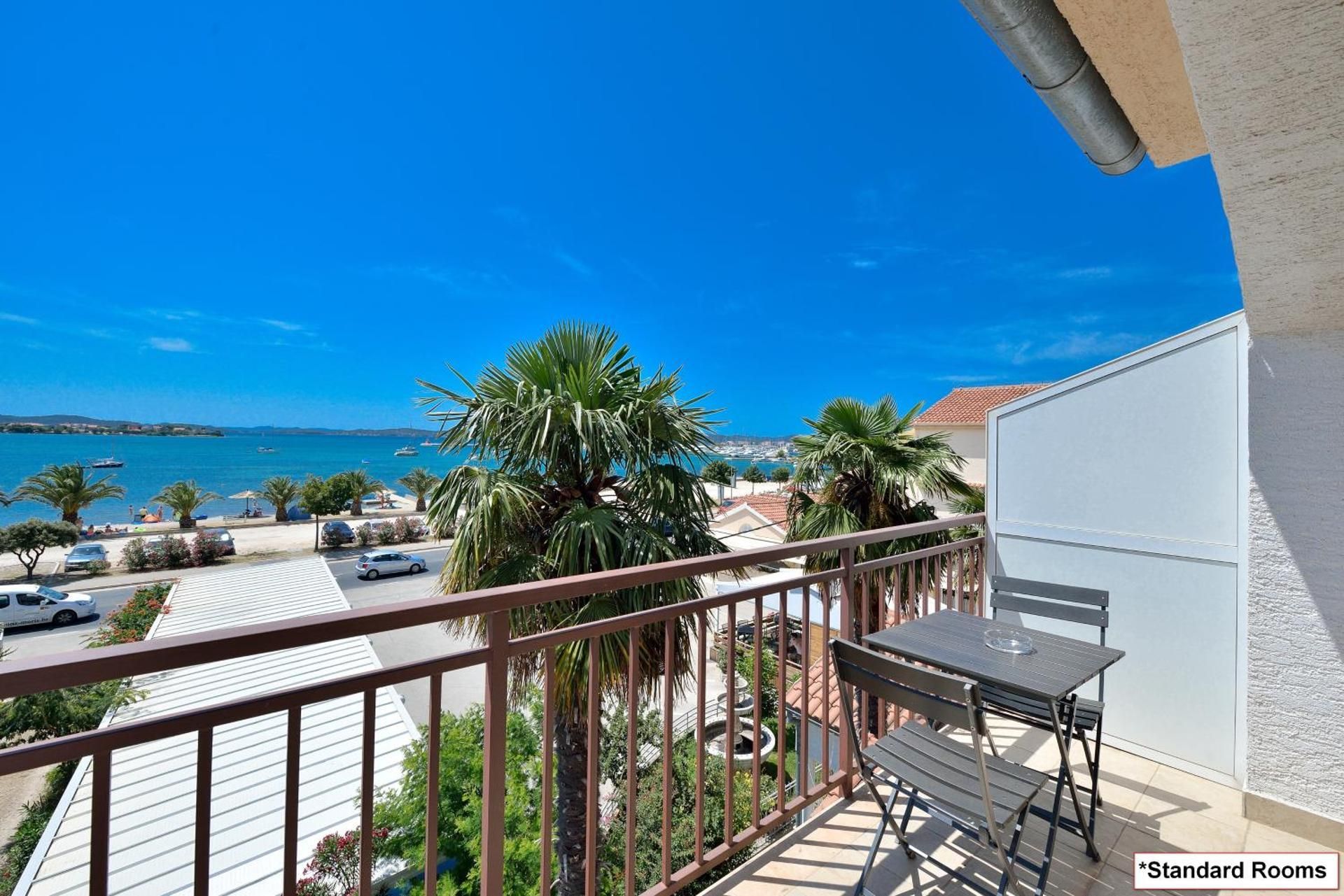 Triple Room with Balcony and Sea View