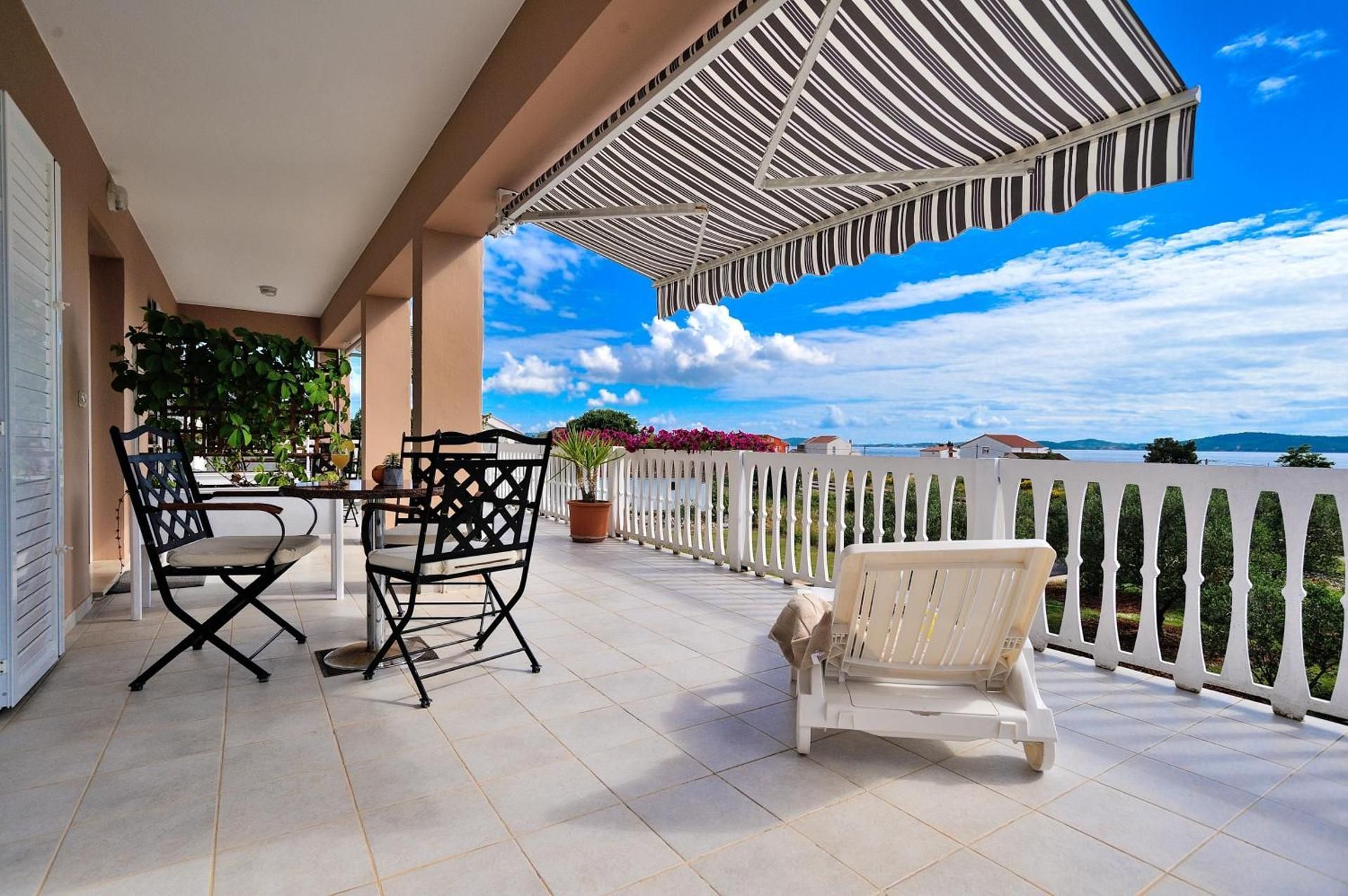 One-Bedroom Apartment with Balcony and Sea View