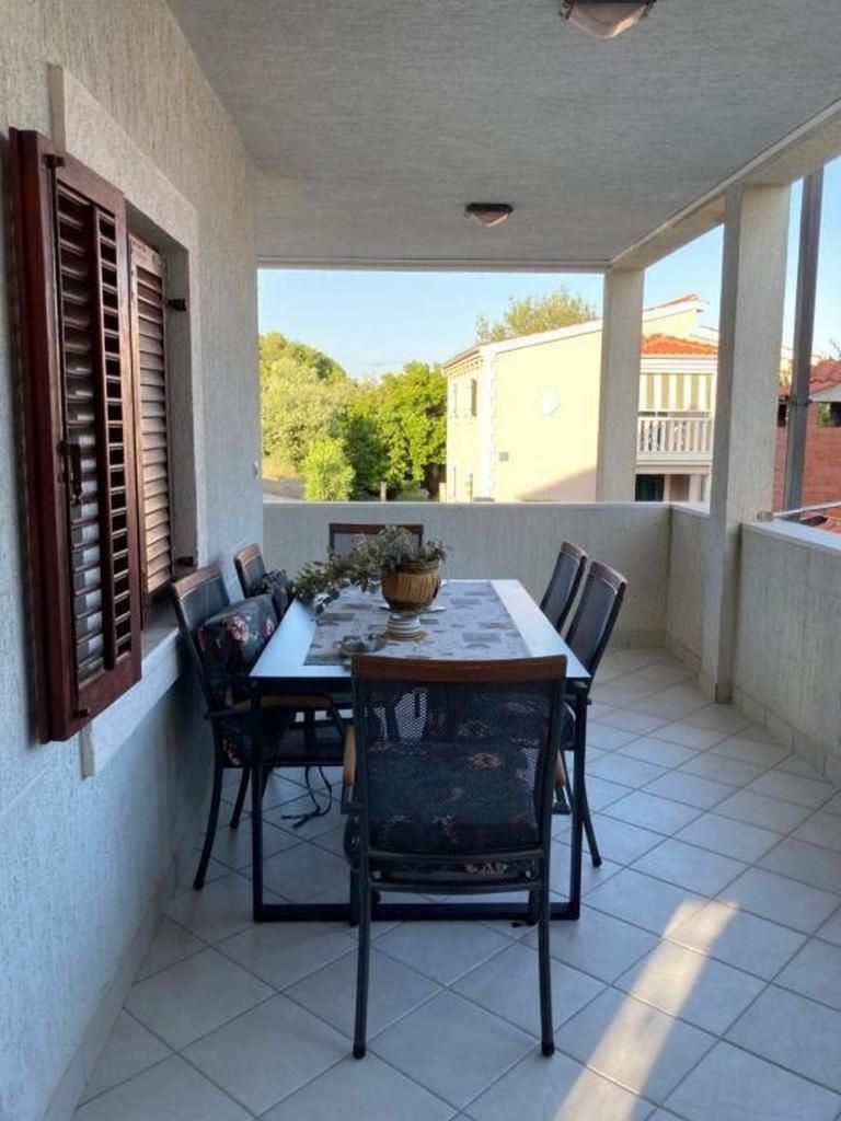 Three-Bedroom Apartment with Terrace and Sea View