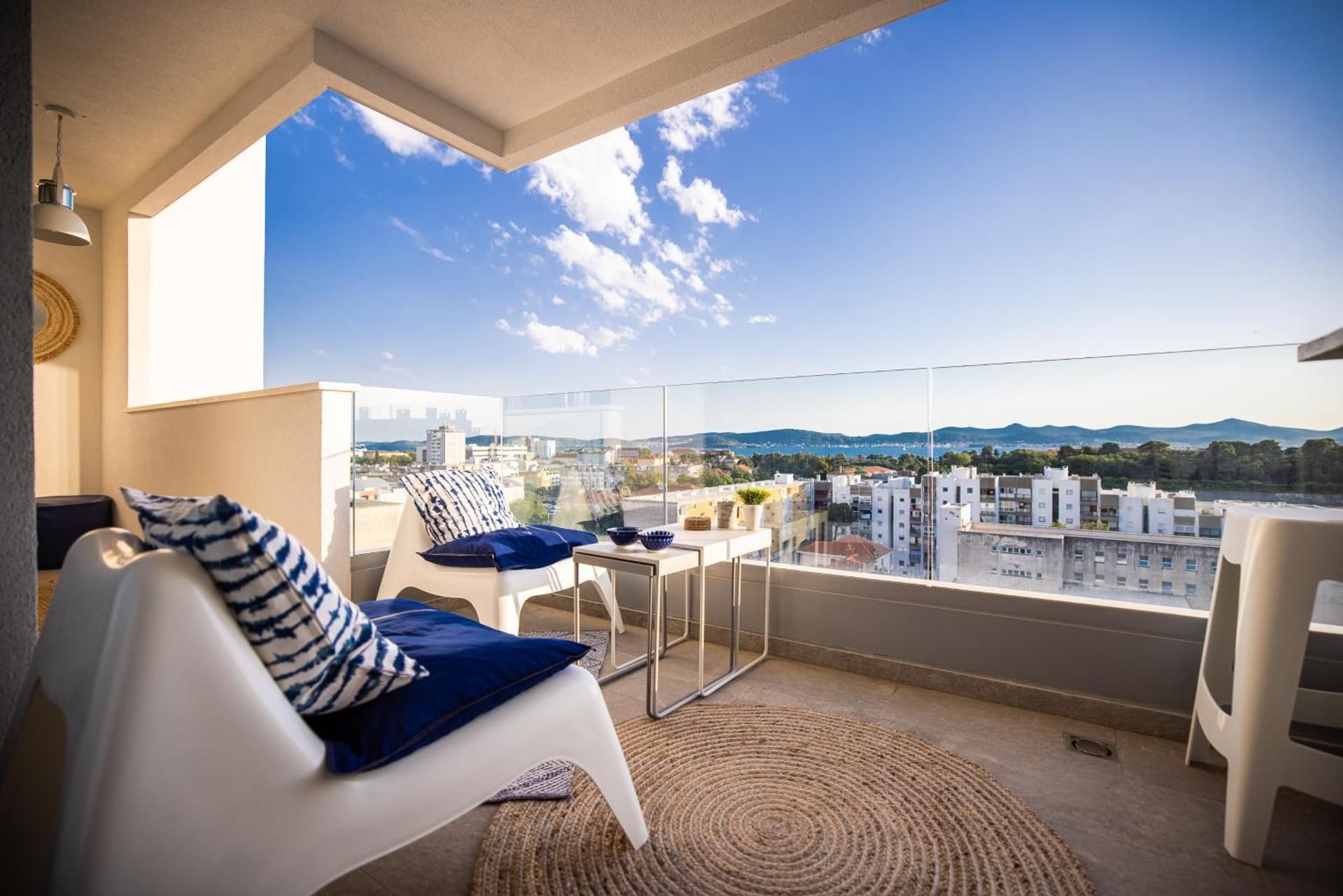 One-Bedroom Apartment with Terrance and Sea View