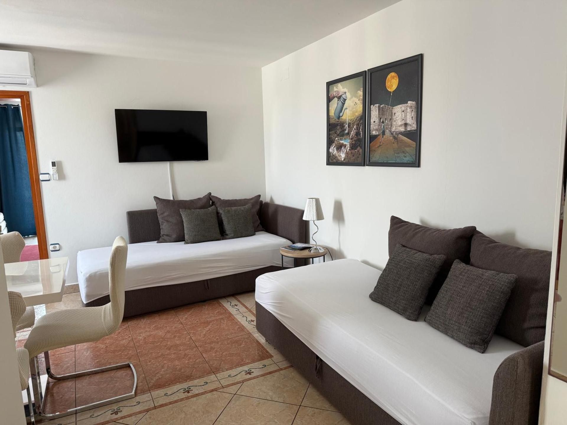 One-Bedroom Apartment with Balcony and Sea View