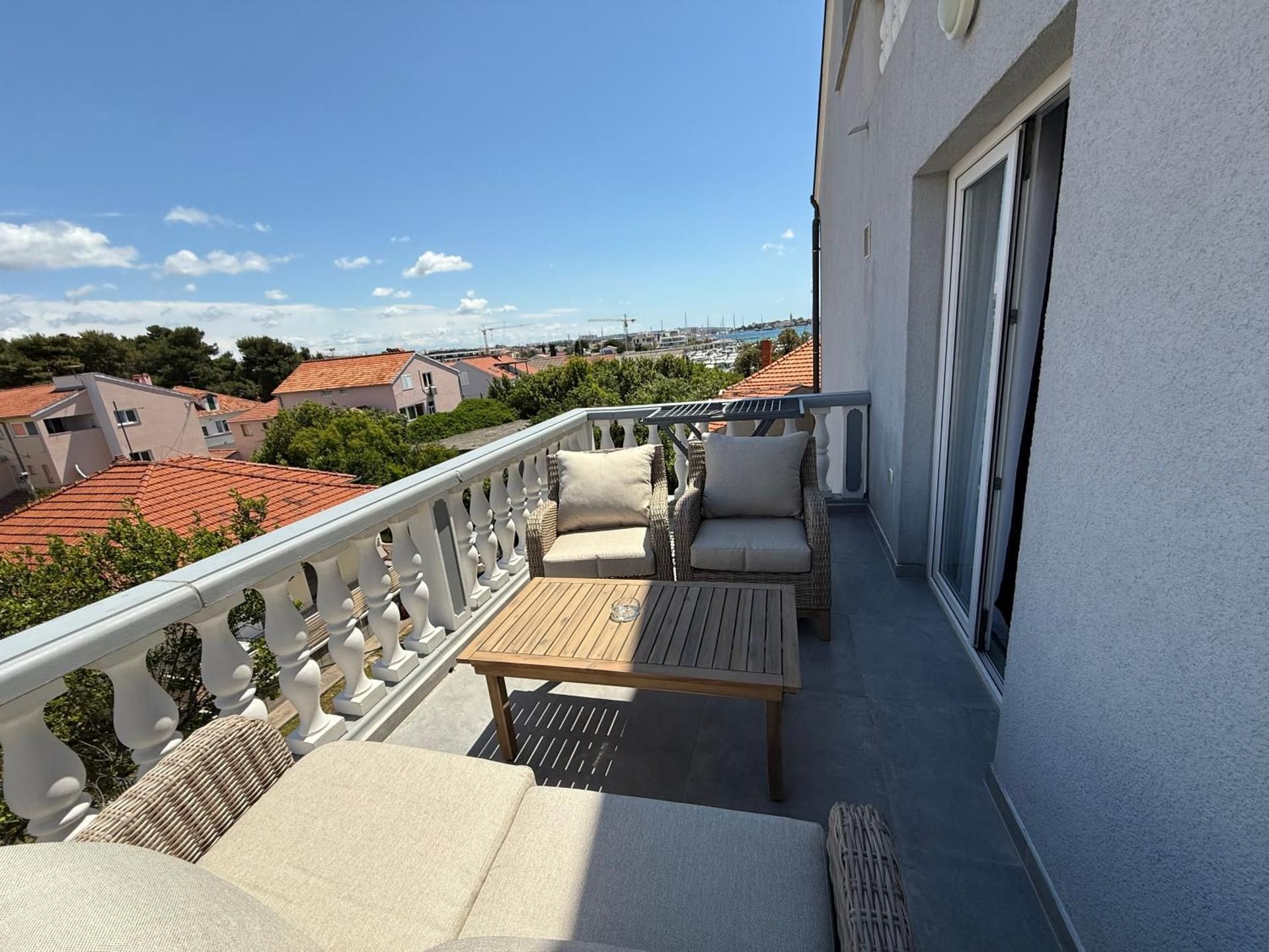 One-Bedroom Apartment with Balcony and Sea View