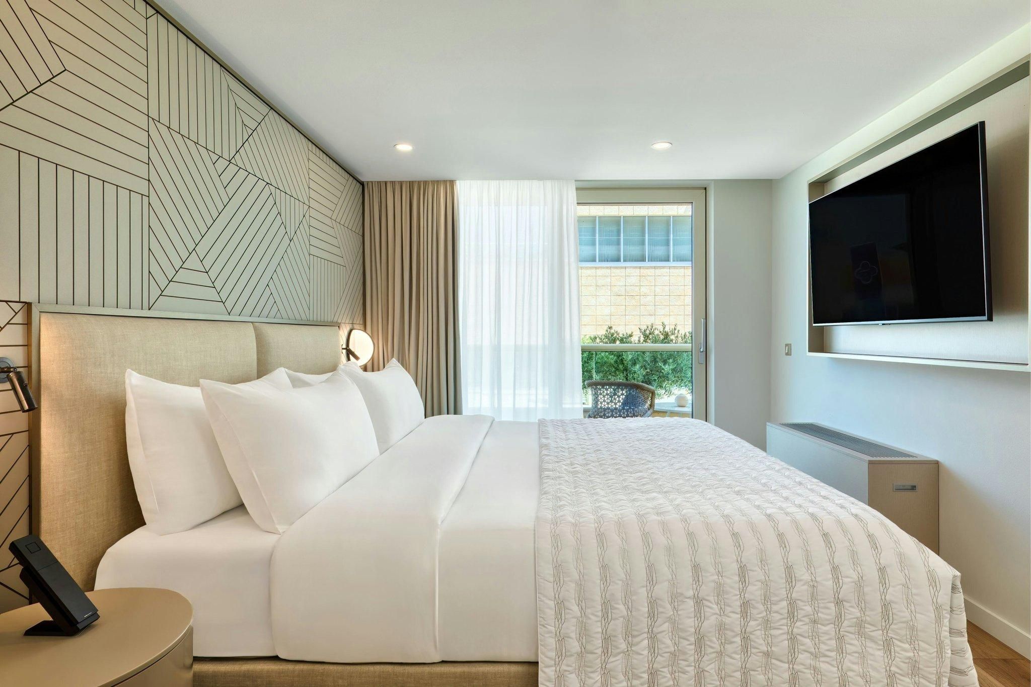 3 Bedroom Family Suite, Bedroom 1: 1 King, Bedroom 2: 1 King, Bedroom 3: 1 Twin bunk, Balcony