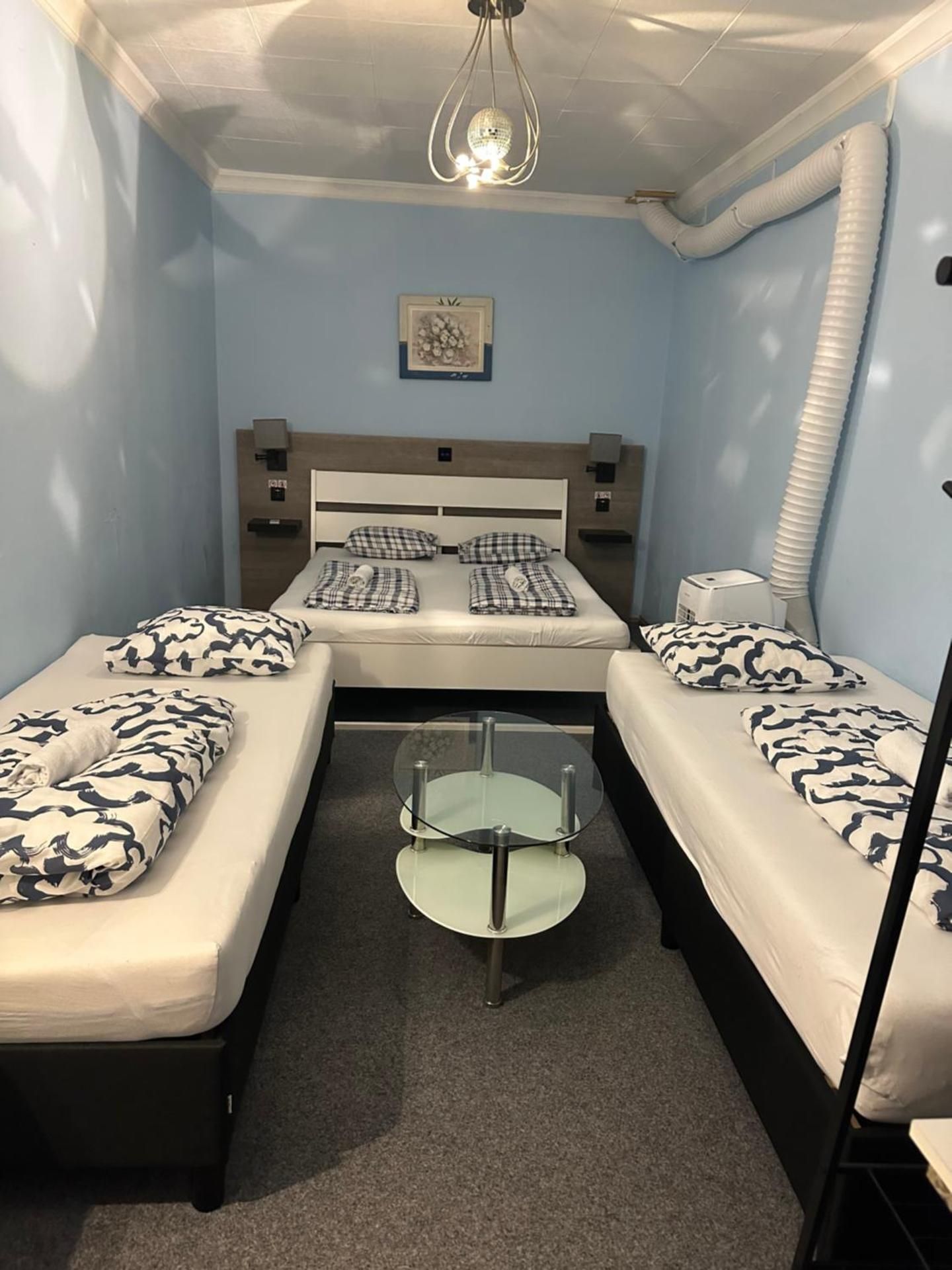 Economy Quadruple Room with Shared Bathroom