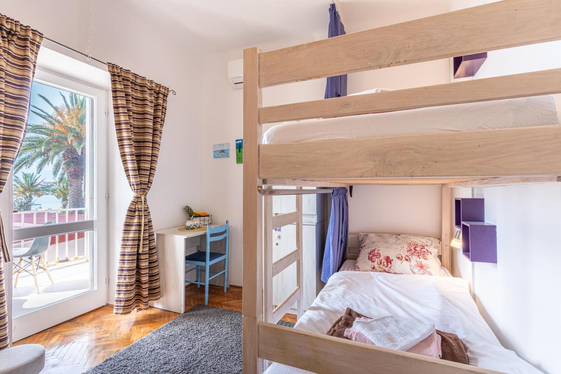 Bed in 4-Bed Mixed Dormitory Room with Balcony and Sea View