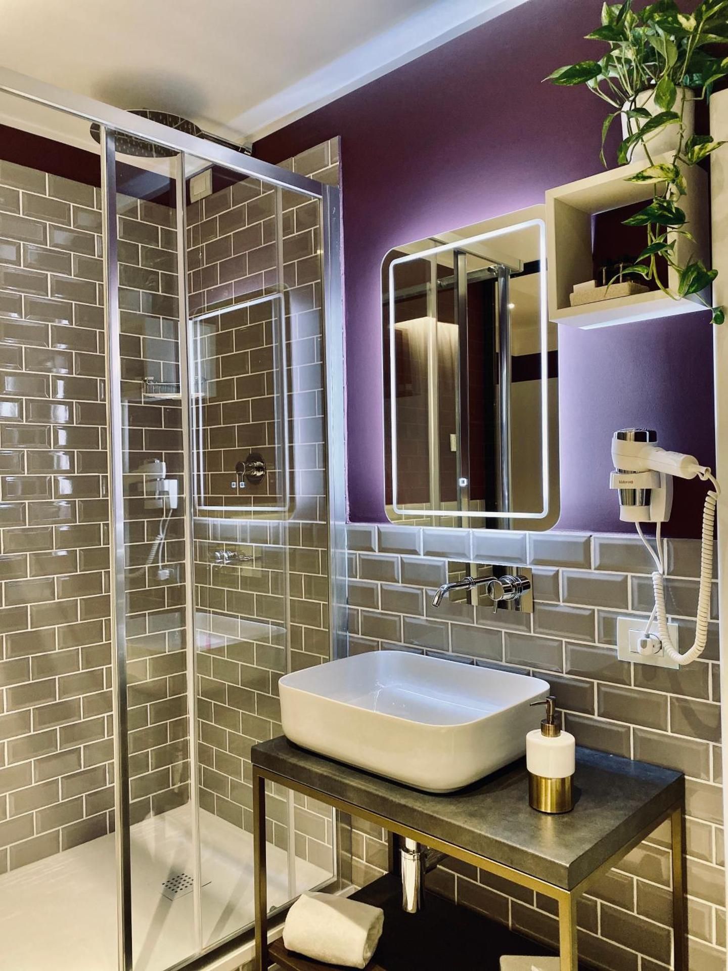 Dimora del Teatro Quadruple Room 2