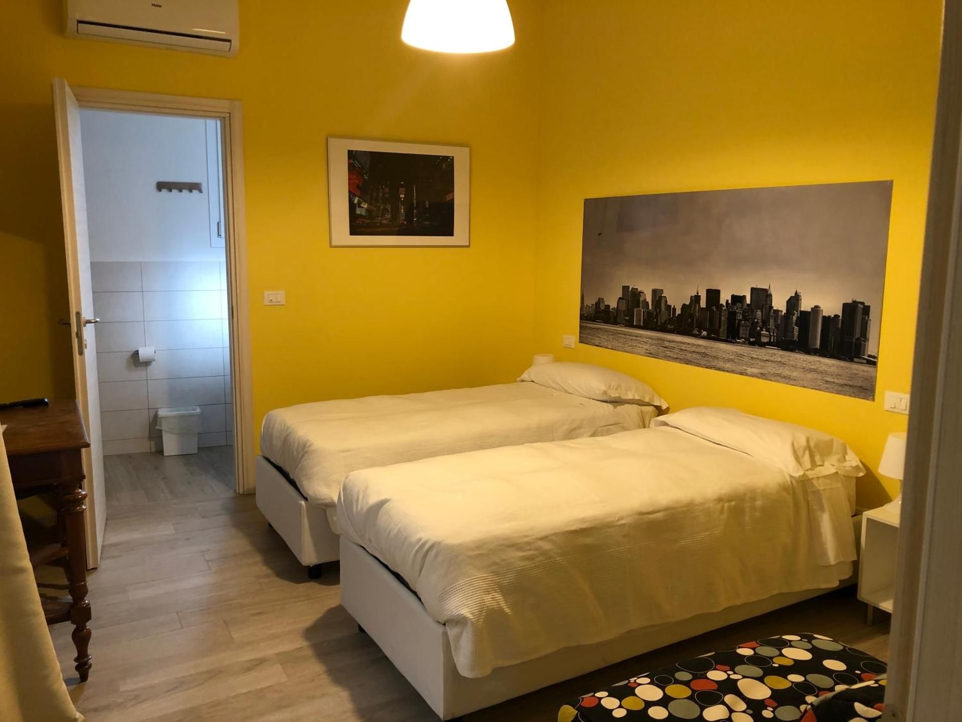 Quadruple Room with Private Bathroom