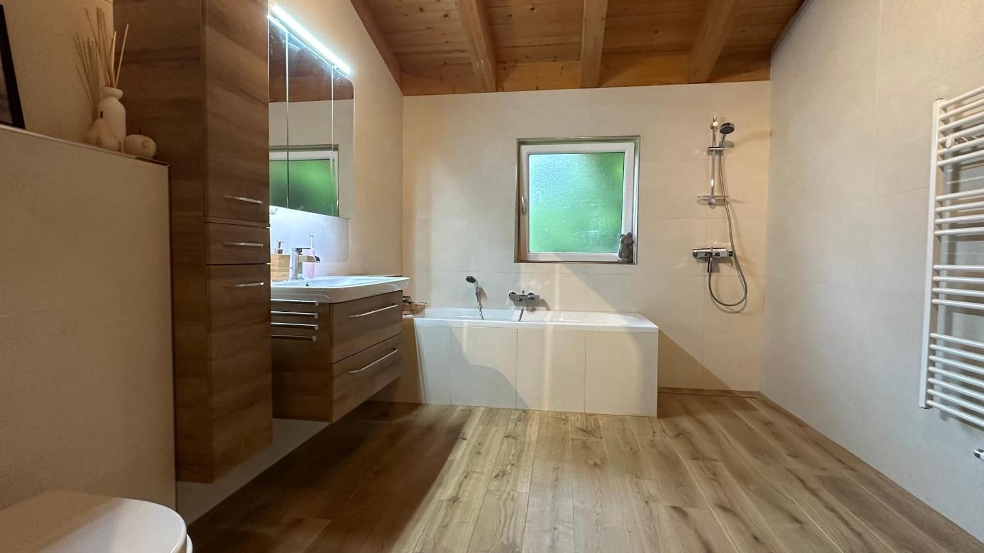 Four-Bedroom Apartment with Balcony 