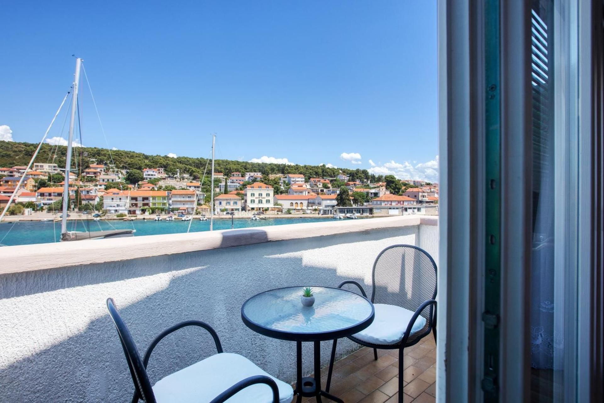 One-Bedroom Apartment with Balcony and Sea View