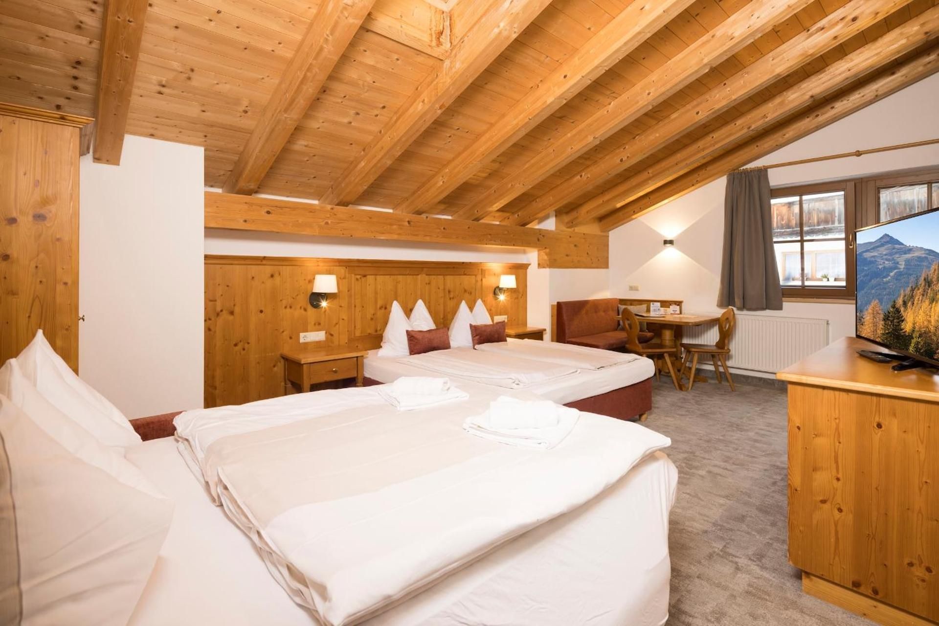 Quadruple Room (2 Adults + 2 Children)