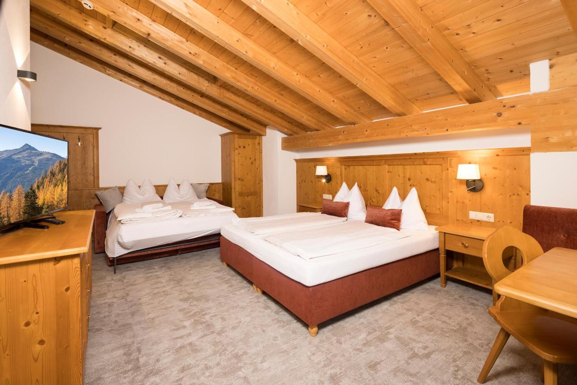 Quadruple Room (2 Adults + 2 Children)