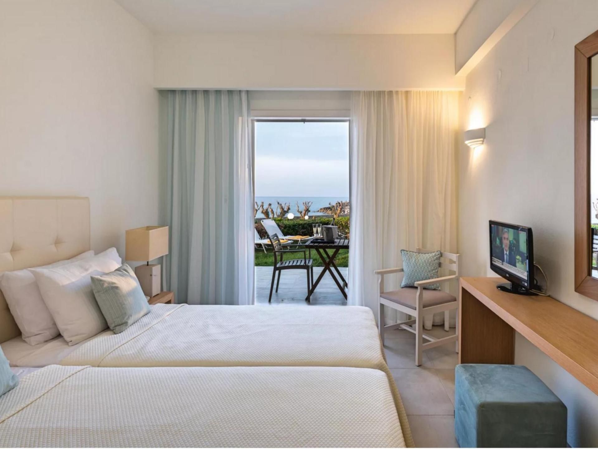 Quadruple Room with Sea View ( 2 Adults & 2 Children)