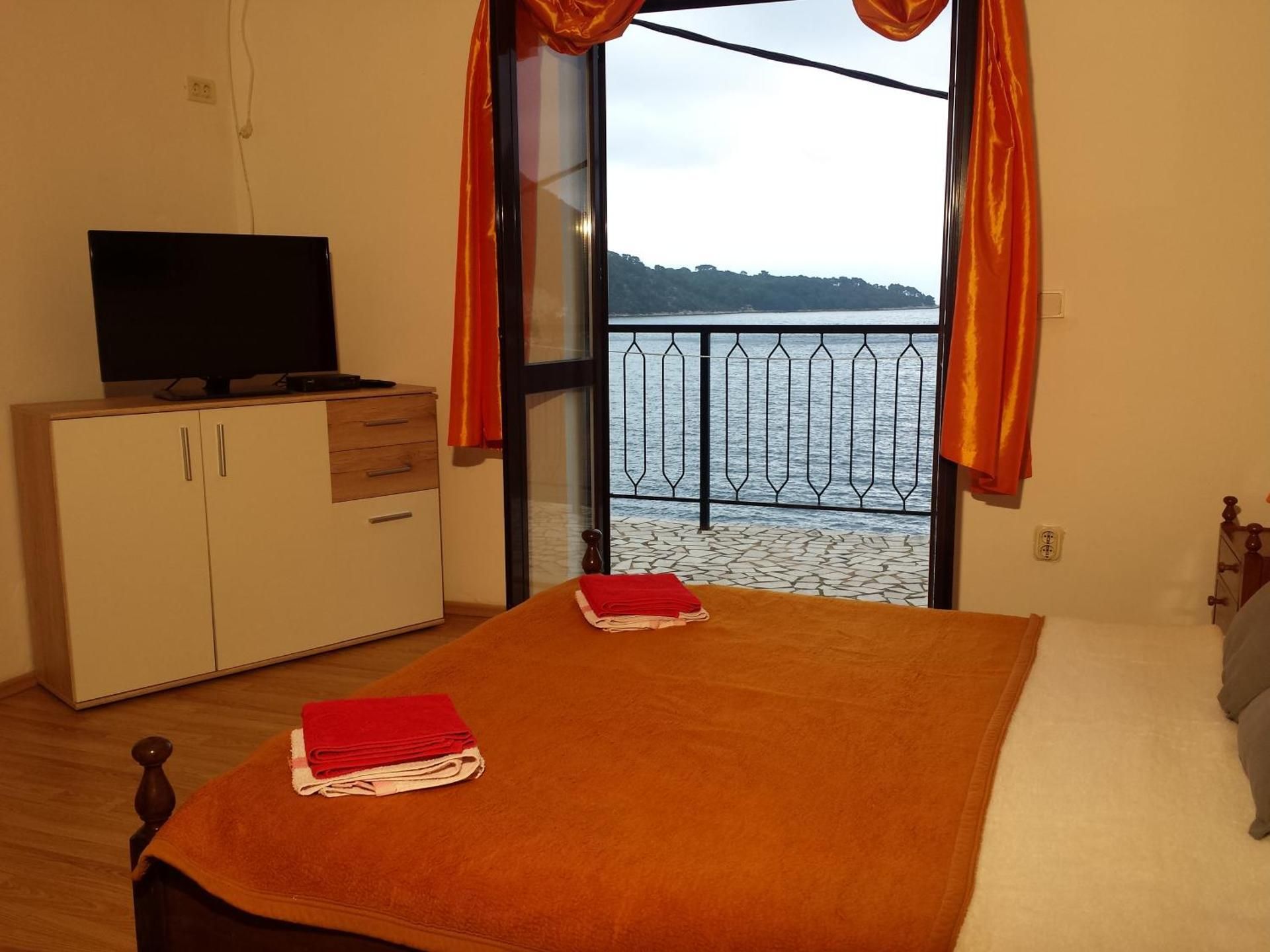 One-Bedroom Apartment with Balcony and Sea View