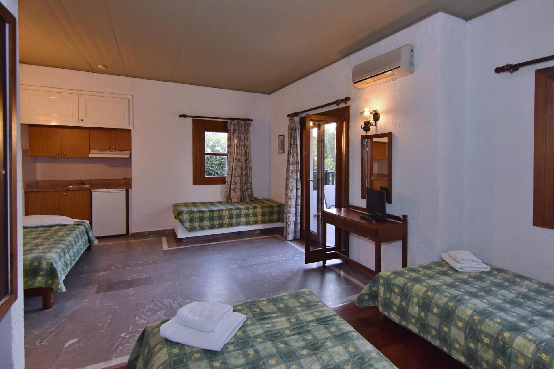 Economy Double Room (3 Adults + 1 Child)