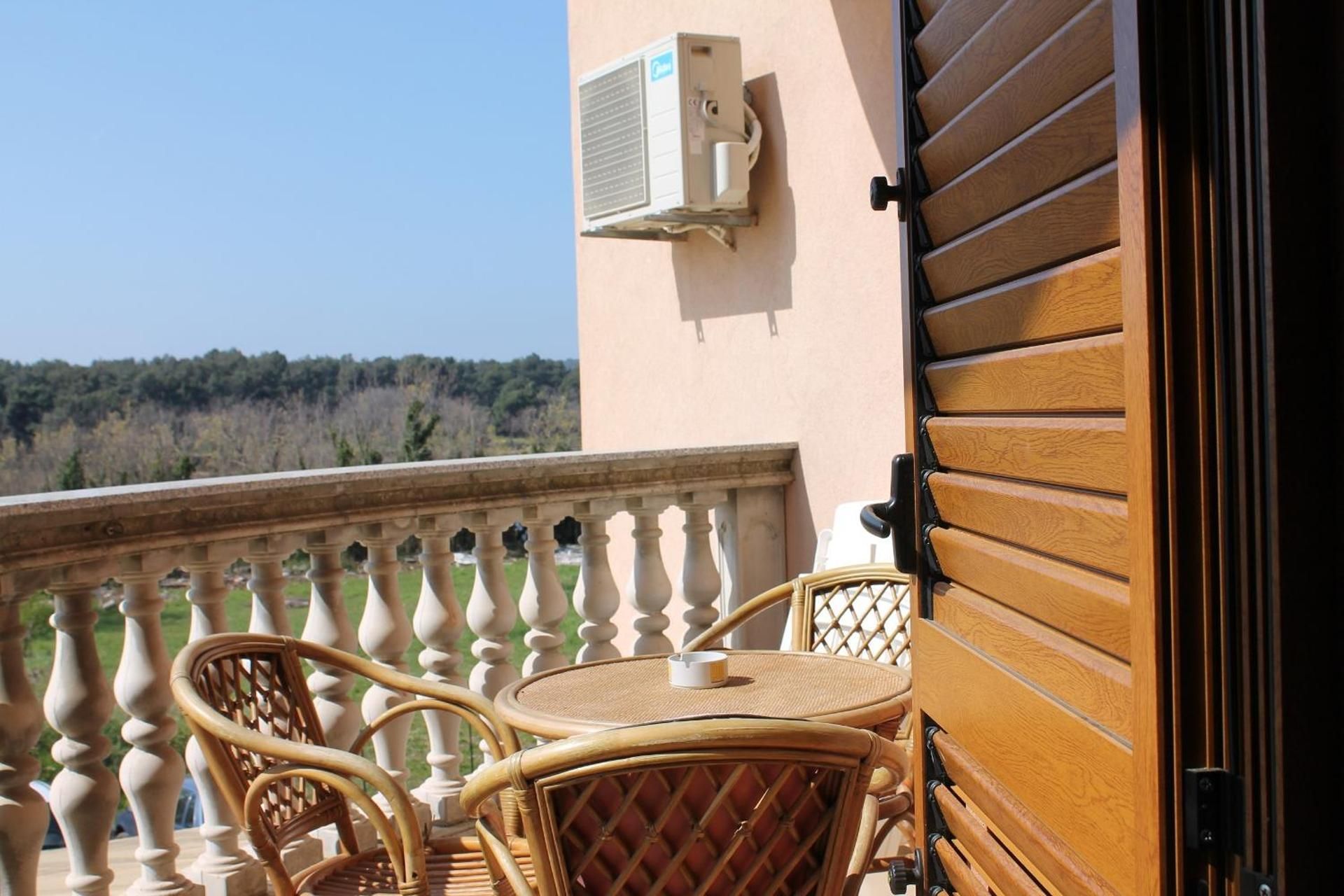 One-Bedroom Apartment with Balcony and Sea View