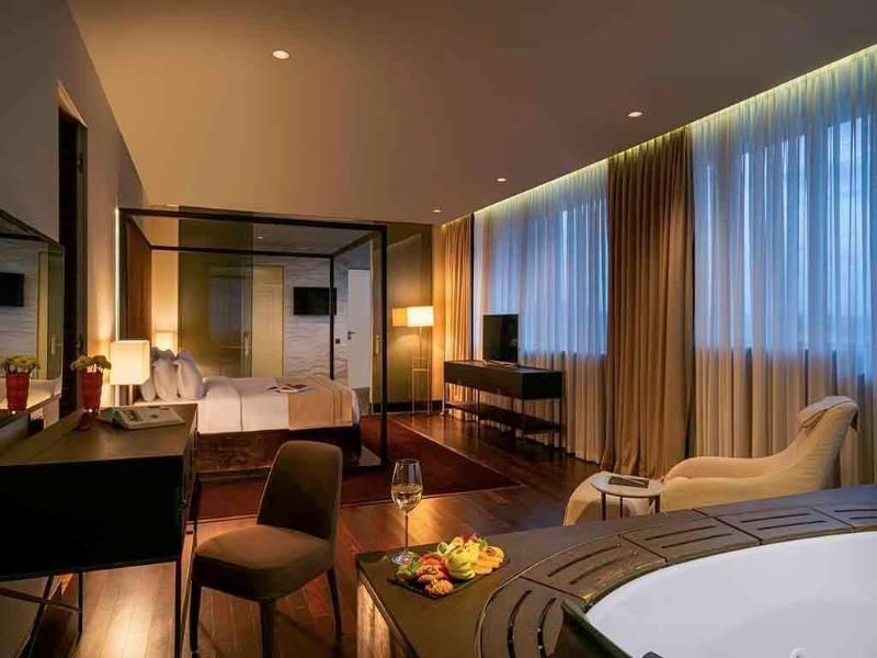 Prestige room with 1 king size bed and sofa