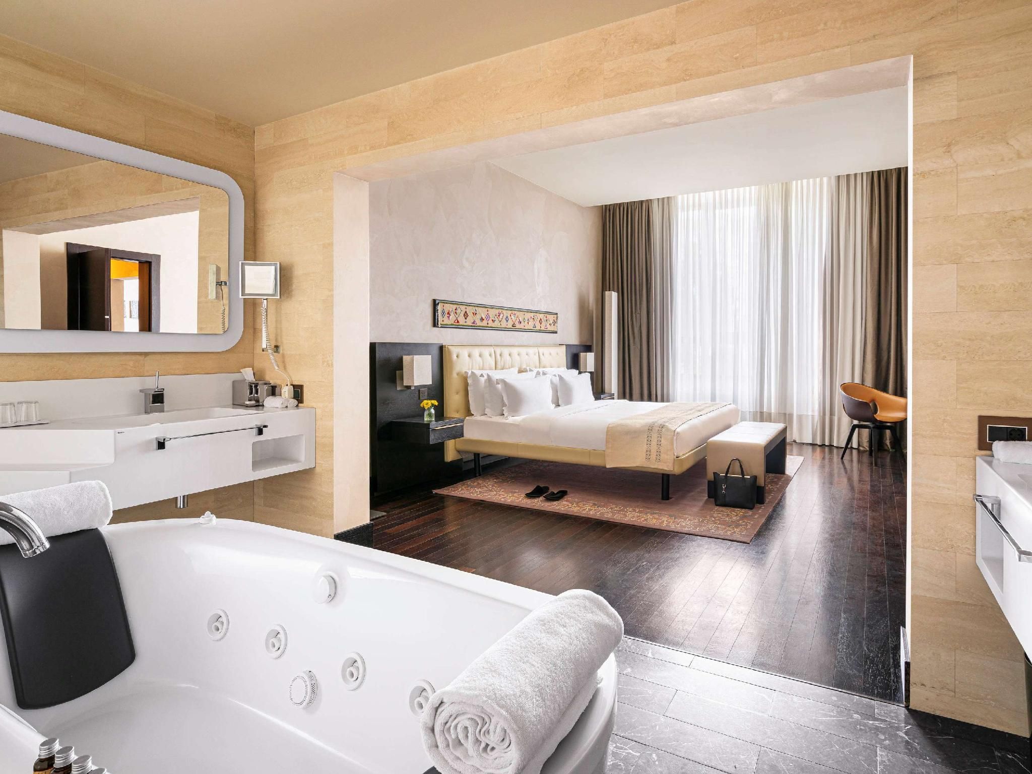 Signature room with 1 king size bed and sofa
