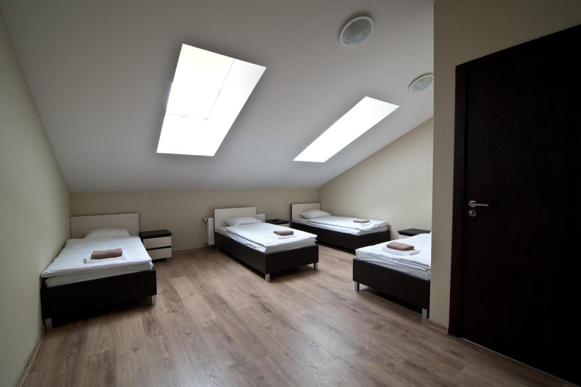 Quadruple Room with four single beds
