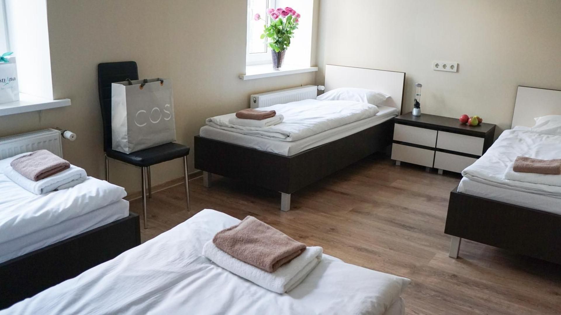 Quadruple Room with four single beds