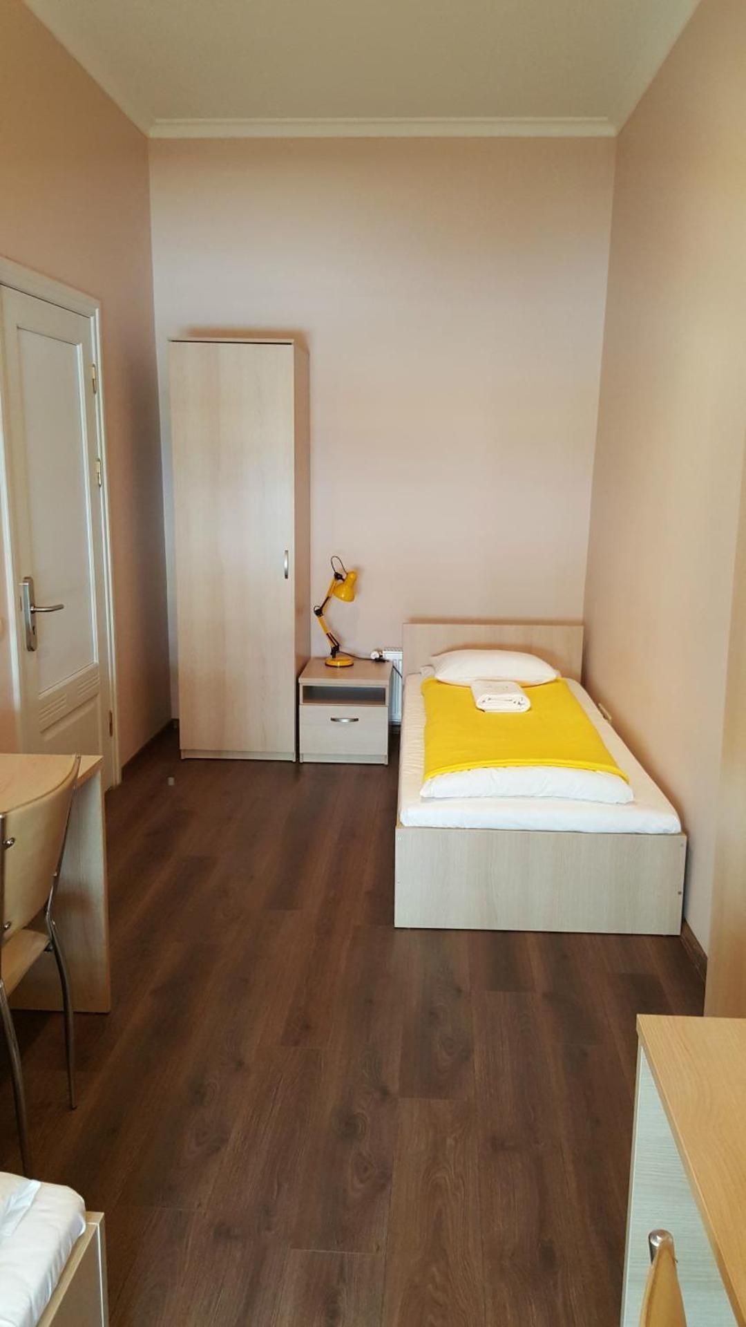 Single Room with Shared Shower and Toilet