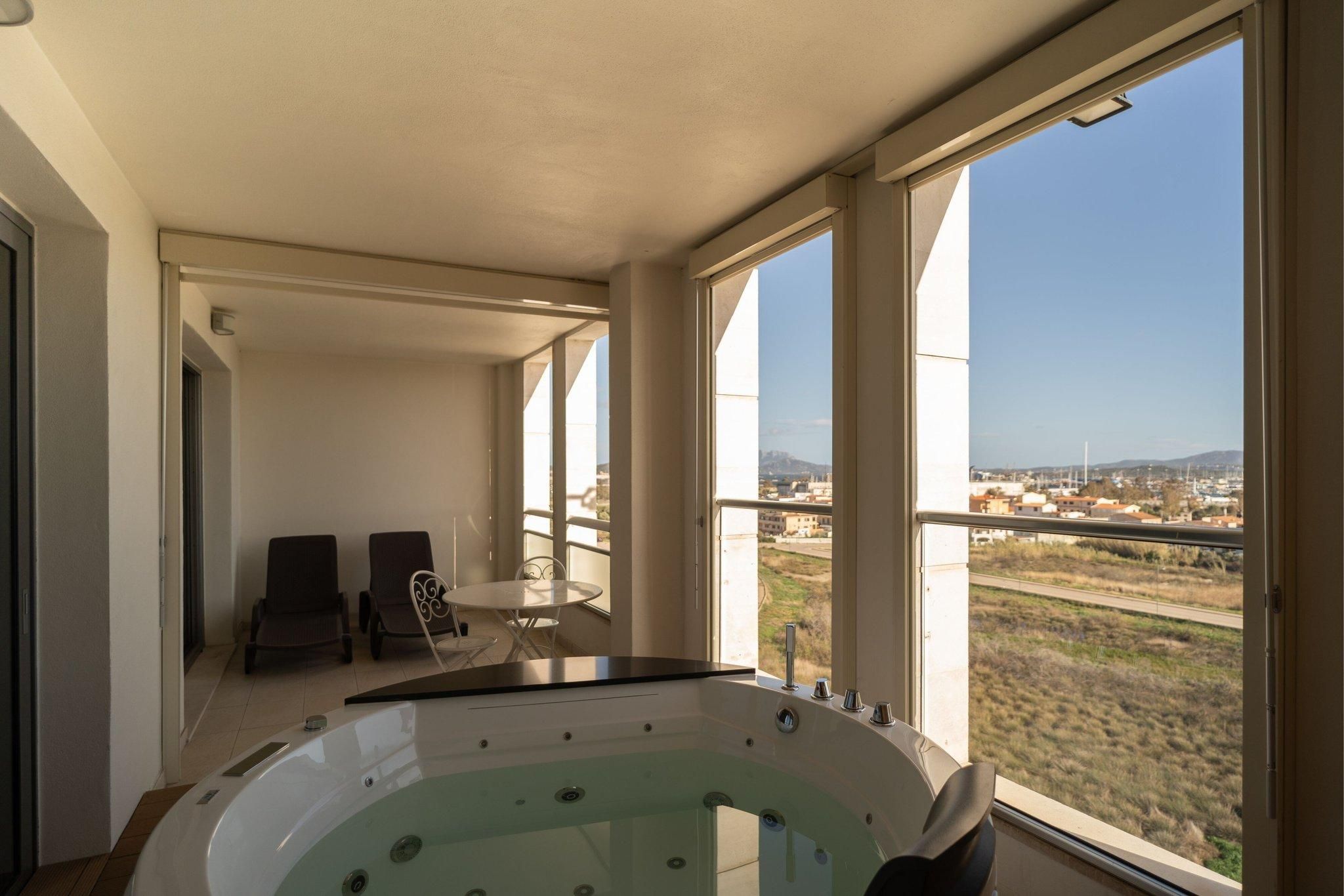 Spa Suite, 1 Bedroom Suite, 1 King, Sofa bed, Harbor view, Balcony, Whirlpool