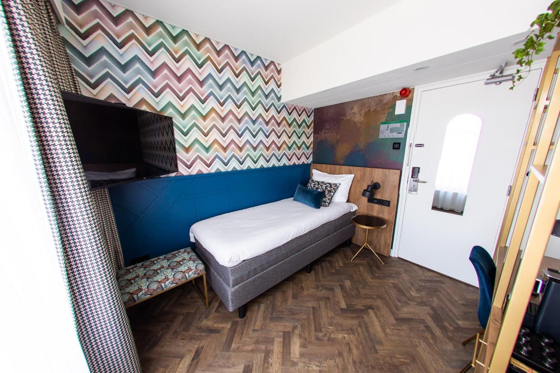 Hotel Haarhuis Classic Single Room, Efficiently Designed, Equipped With Single Bedding, And Chair