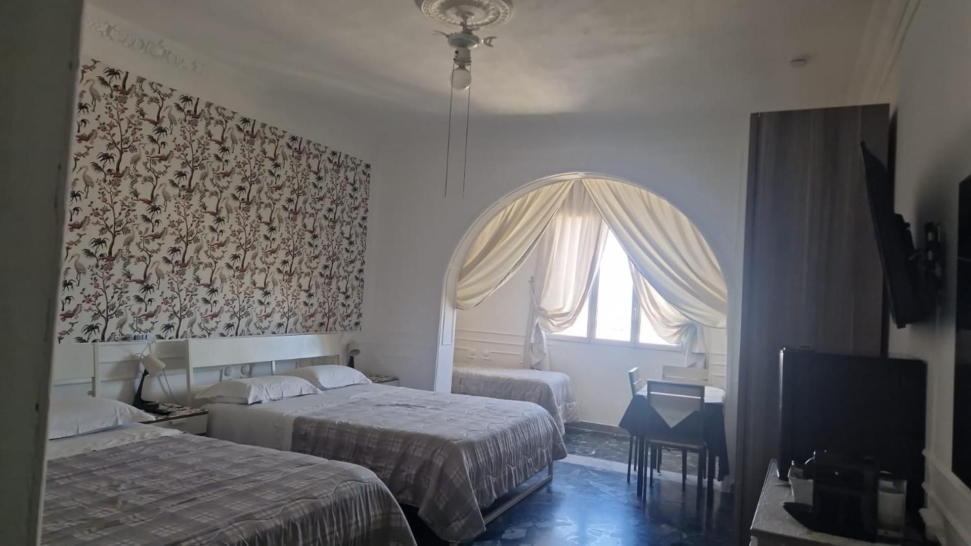 Quadruple Room with Private Bathroom