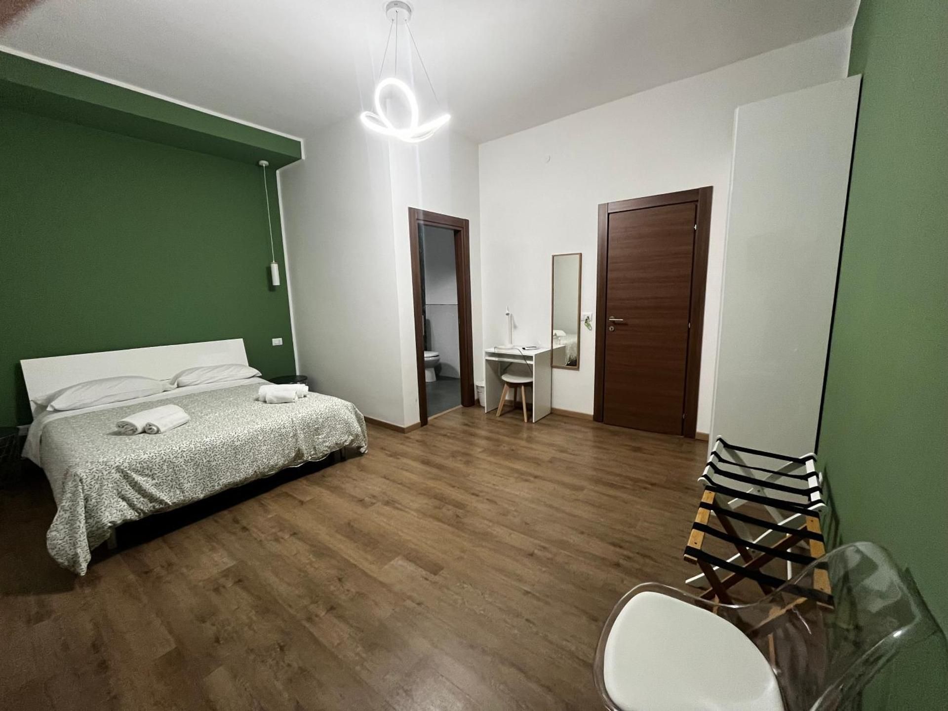 Quadruple Room with Private Bathroom