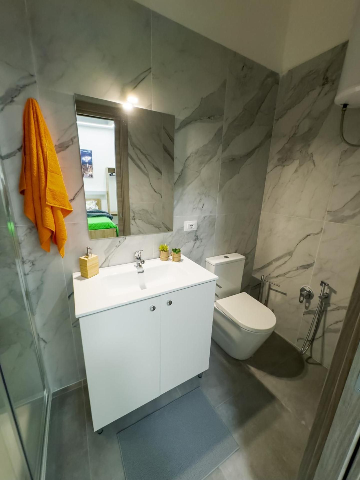 Quadruple Room with Private Bathroom